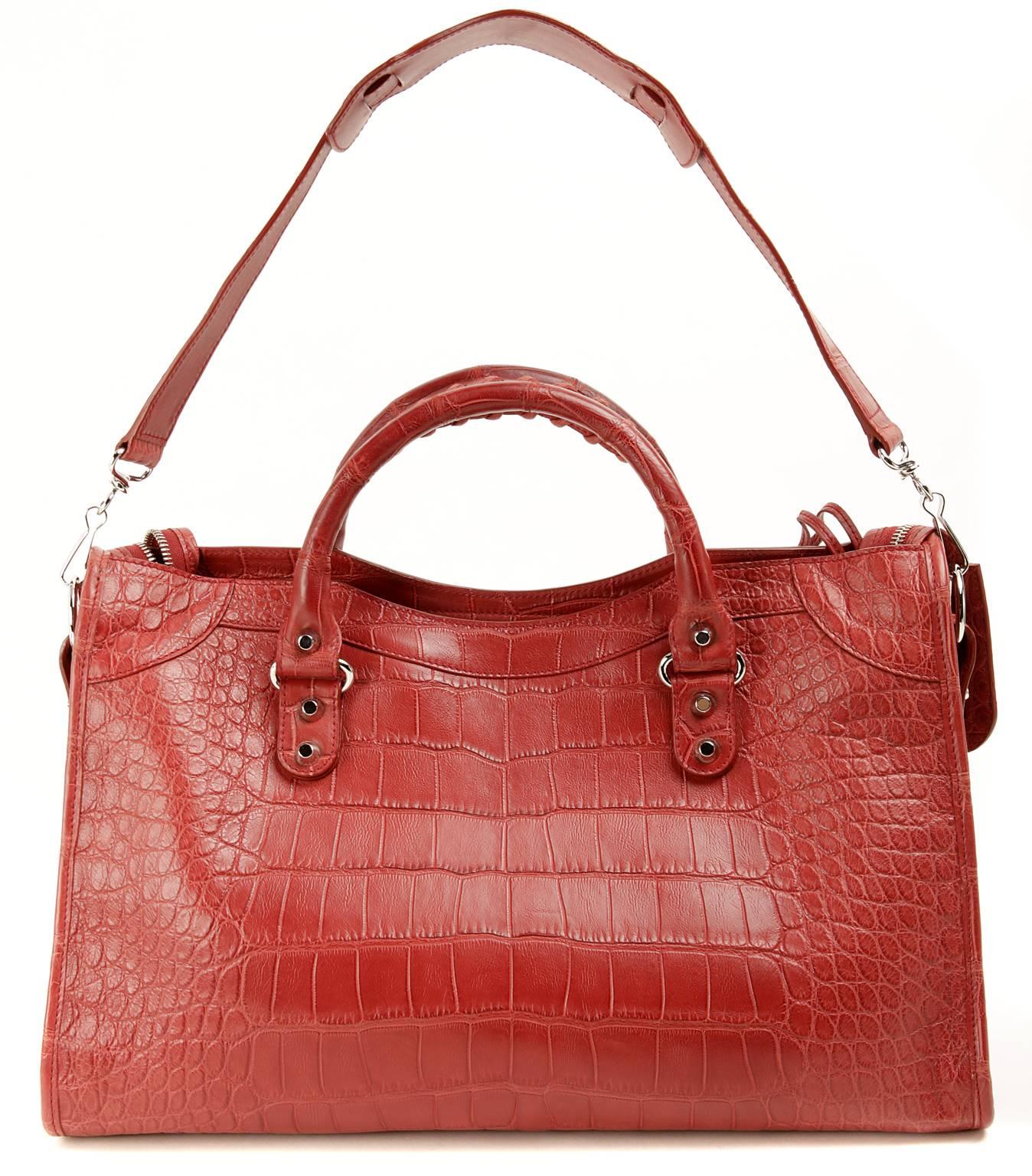 Balenciaga Red Crocodile City Bag- PRISTINE; Appears Never Before Carried
 Rarely seen in crocodile skin, the classic Balenciaga style maintains all the moto inspired details that have made it an iconic favorite. 
 
Matte red crocodile skin