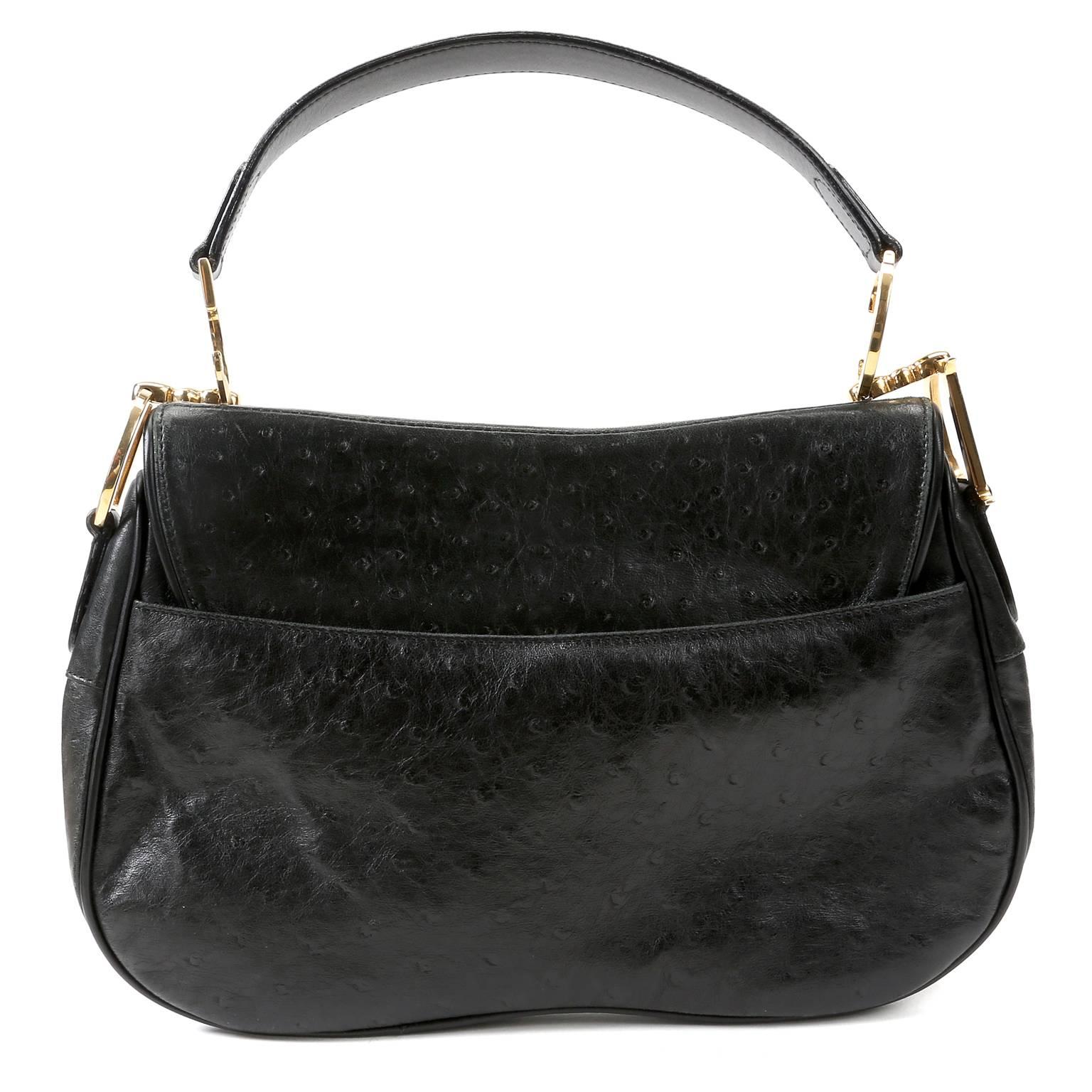 Christian Dior Black Ostrich Double Saddle Bag- MINT
  This is the larger version of the iconic style made famous by Sarah Jessica Parker’s character on Sex in the City. 
Black ostrich skin construction is both rare and beautiful.  Ostrich skin is
