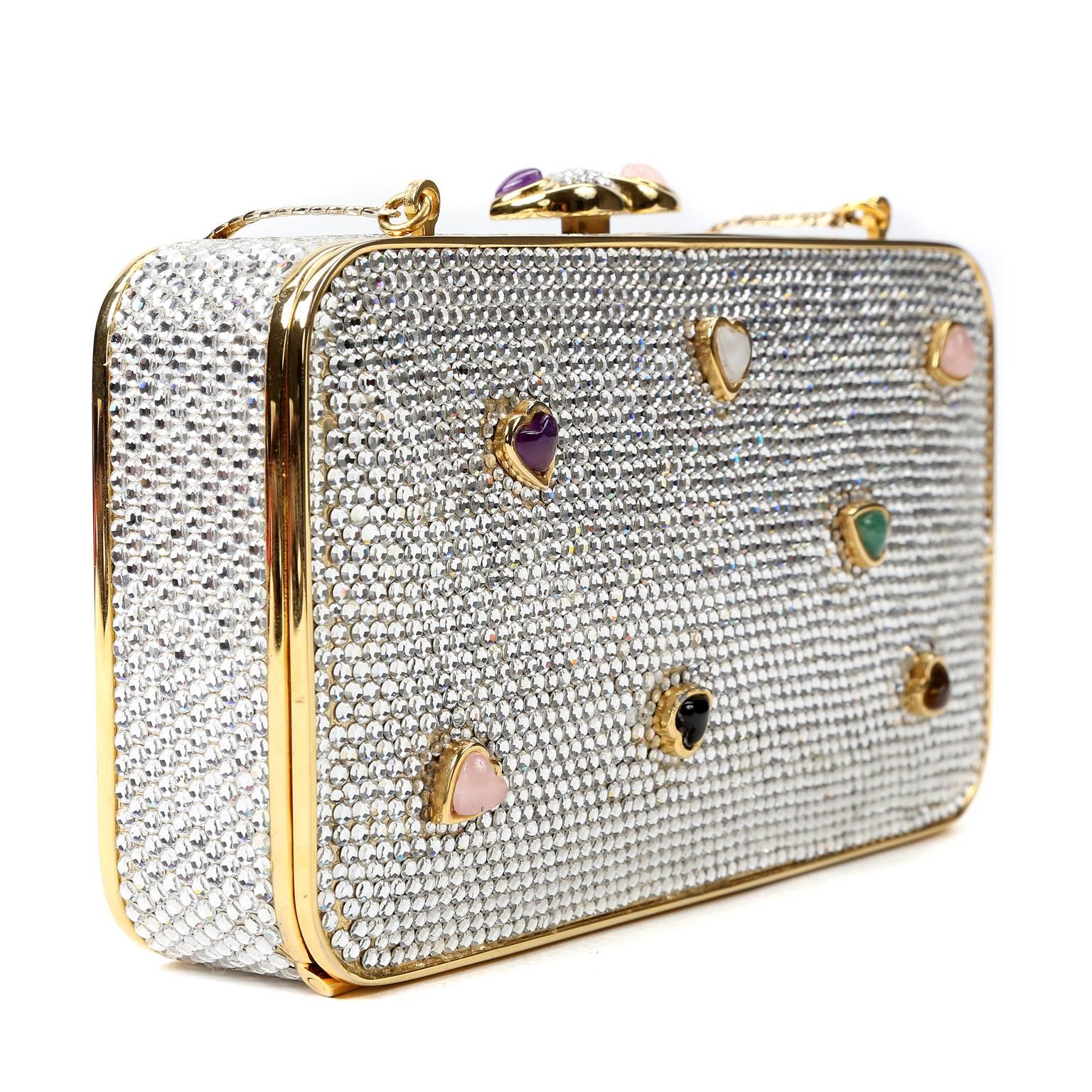 Judith Leiber Crystal Hearts Minaudiere- PRISTINE;  appears never carried.  The stunning jeweled piece is uniquely beautiful and becomes the focal point of any ensemble.
 
Gold framed clutch is encrusted with crystals on all sides.  The front is