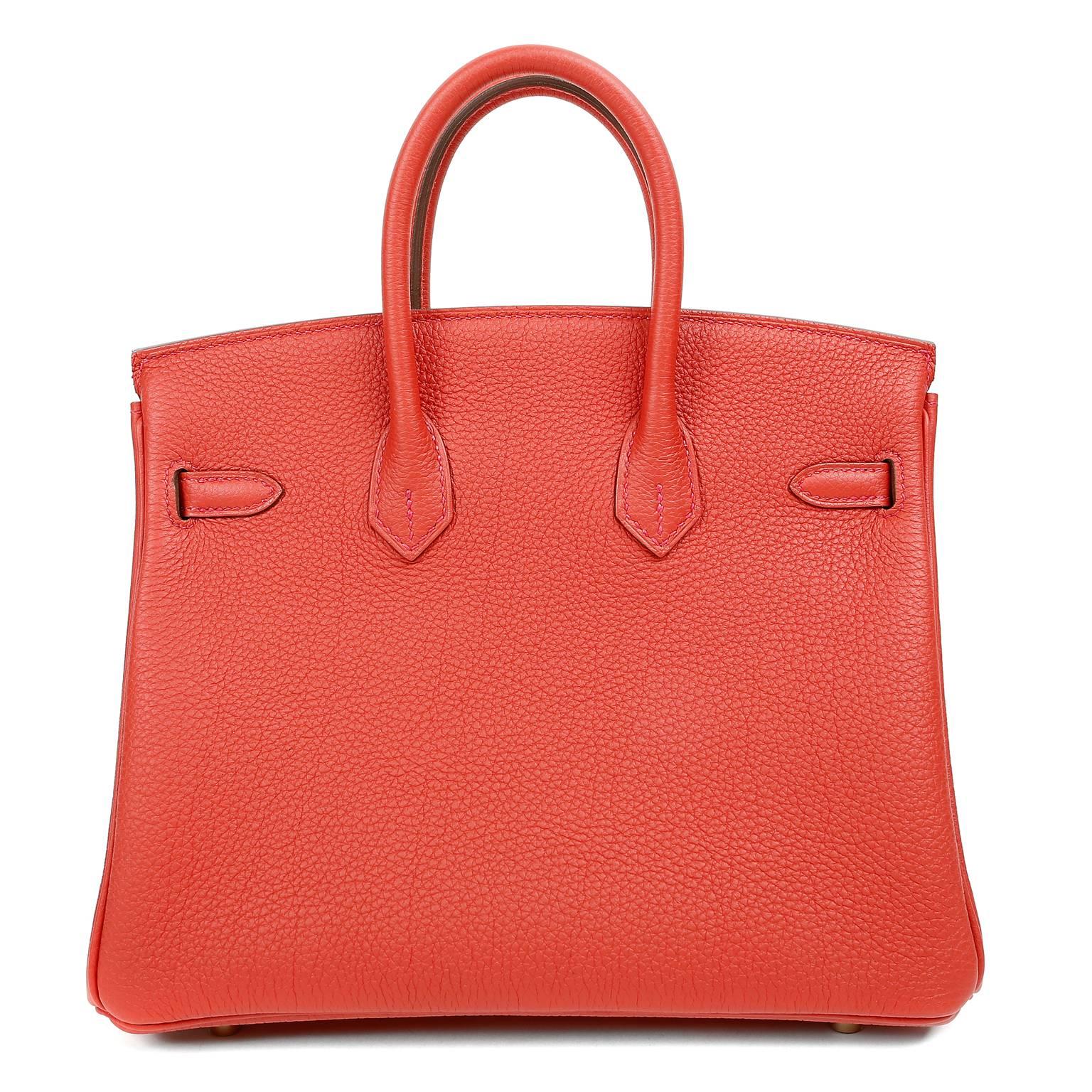 Hermès 25 cm Geranium Togo Birkin Bag.  Plastic is still intact on all hardware.
 Waitlists exceeding a year are commonplace for the intensely coveted Birkin bag.  Each piece is hand crafted by skilled artisans and represents the epitome of