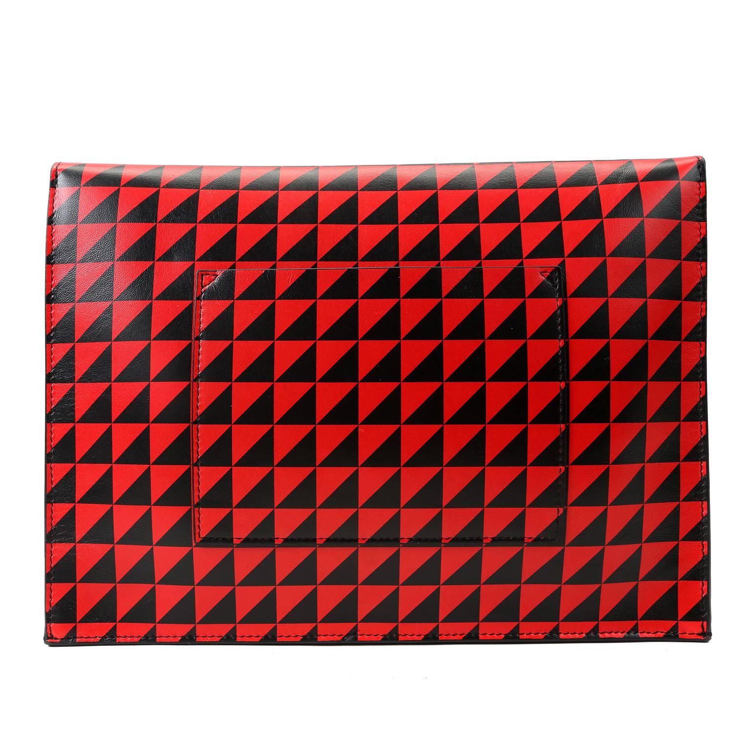 Schouler Triangle Print Large Clutch- PRISTINE
Known as the 