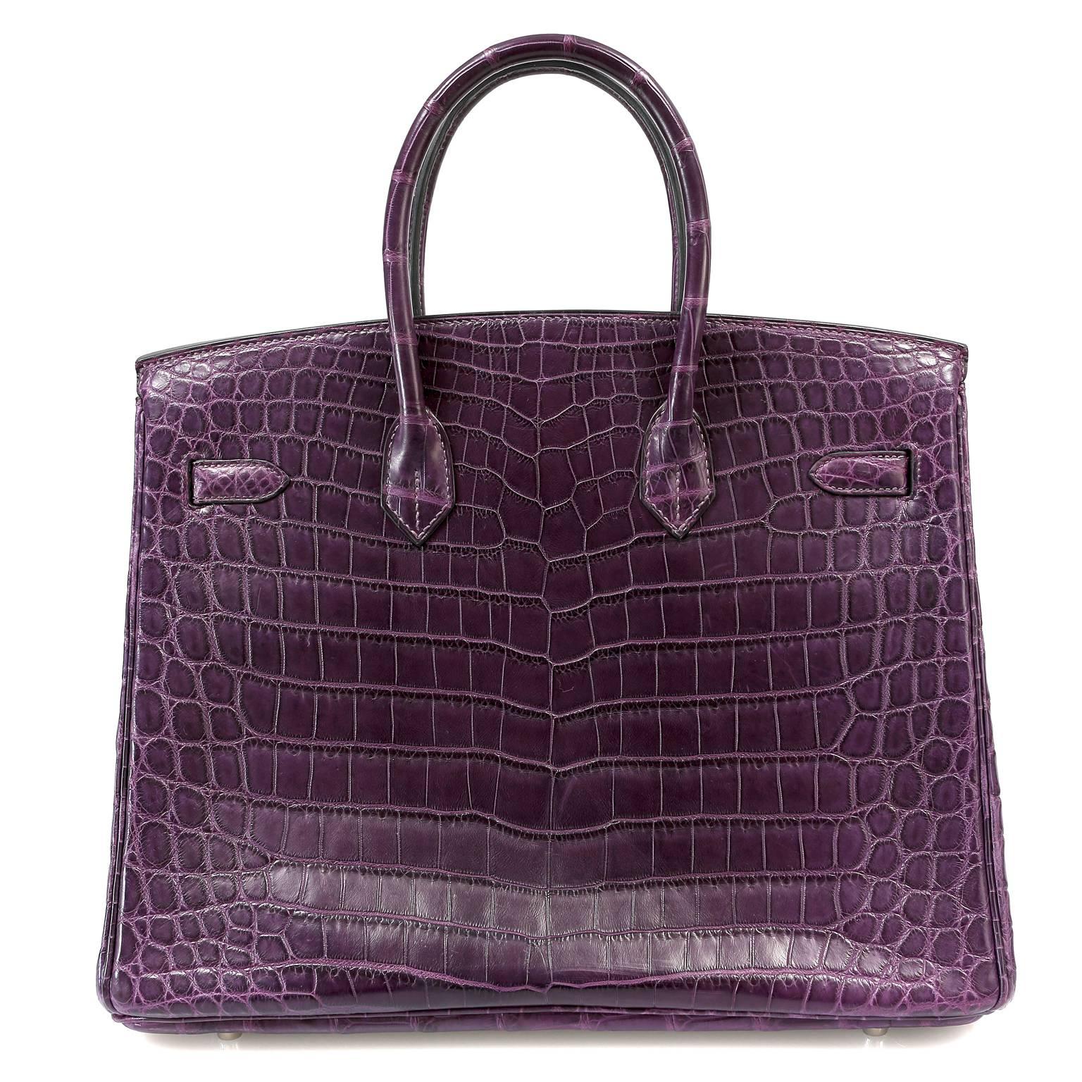 Hermès Amethyst Matte Niloticus Crocodile 35cm Birkin- PRISTINE; Never Carried
 Incredibly rare and specially ordered, this exotic Birkin is truly stunning in jewel toned purple croc with Palladium hardware. 
 
Hermès bags are considered the