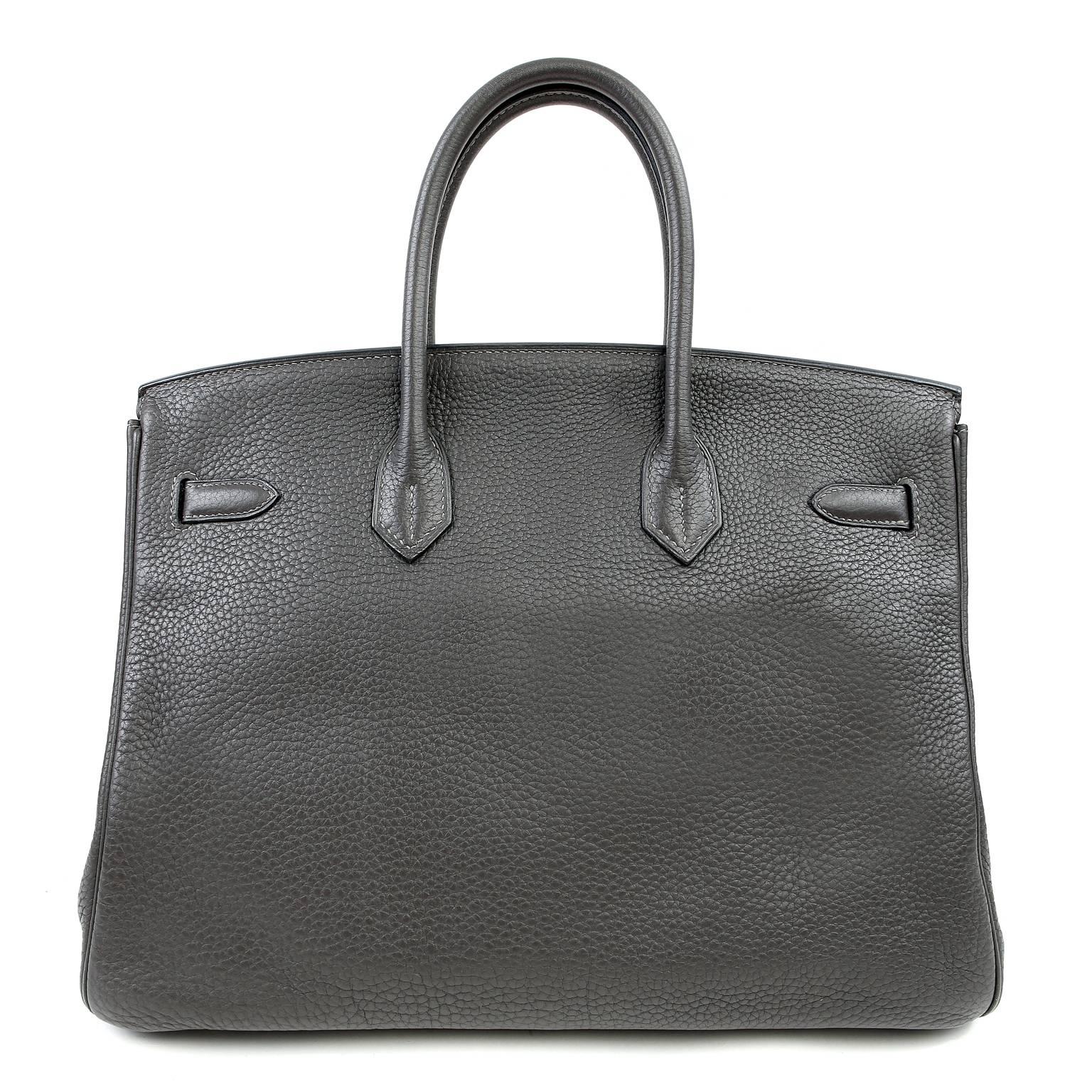 Hermès Graphite 35 cm Clemence  Birkin Bag- PRISTINE
Appears never carried and has the protective plastic intact on the hardware.   Crafted entirely by hand with extensive waistlists, the Birkin is coveted worldwide.
 
  Clemence is made from