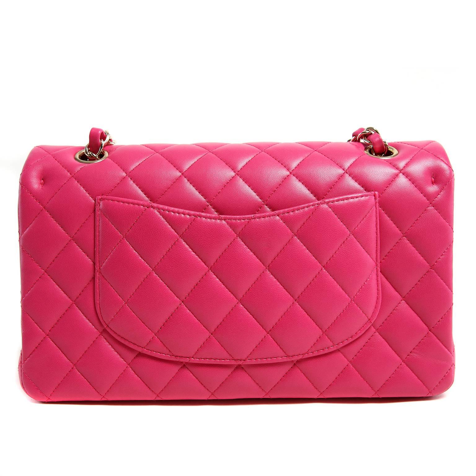 Chanel Fuchsia Leather Double Flap Classic- PRISTINE 
  Perfectly proportioned in the medium silhouette, this eye-catching classic adds a brilliant pop of color to any wardrobe. 
 
Vivid fuchsia leather is quilted in signature Chanel diamond