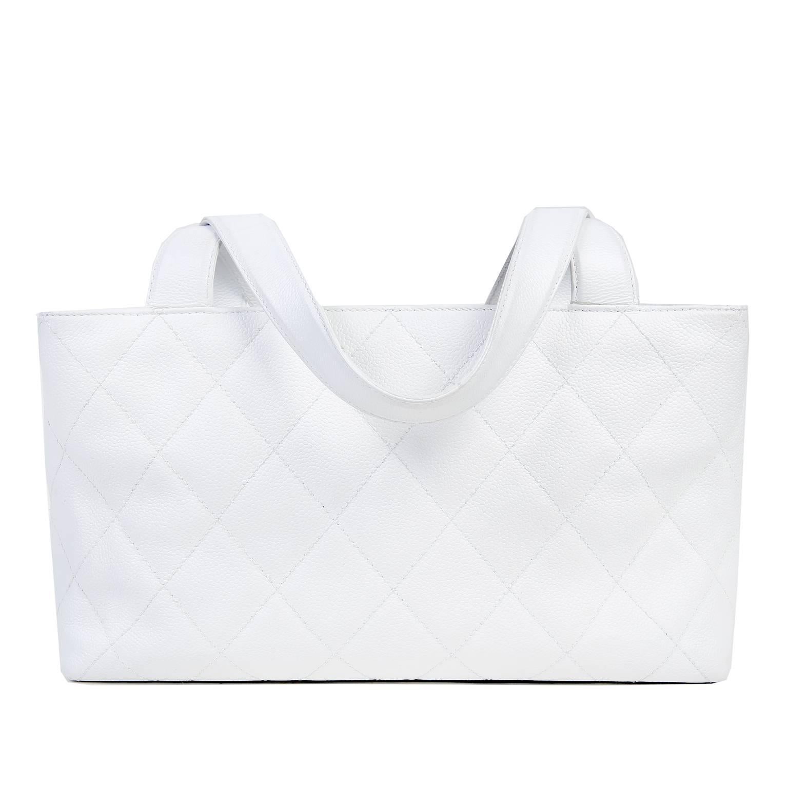 This Authentic Chanel White Caviar Tote is in pristine condition, appearing very rarely carried and carefully stored.  A timeless piece that is certain to become a wardrobe favorite, this classic Chanel is a great find. 

Snowy white caviar