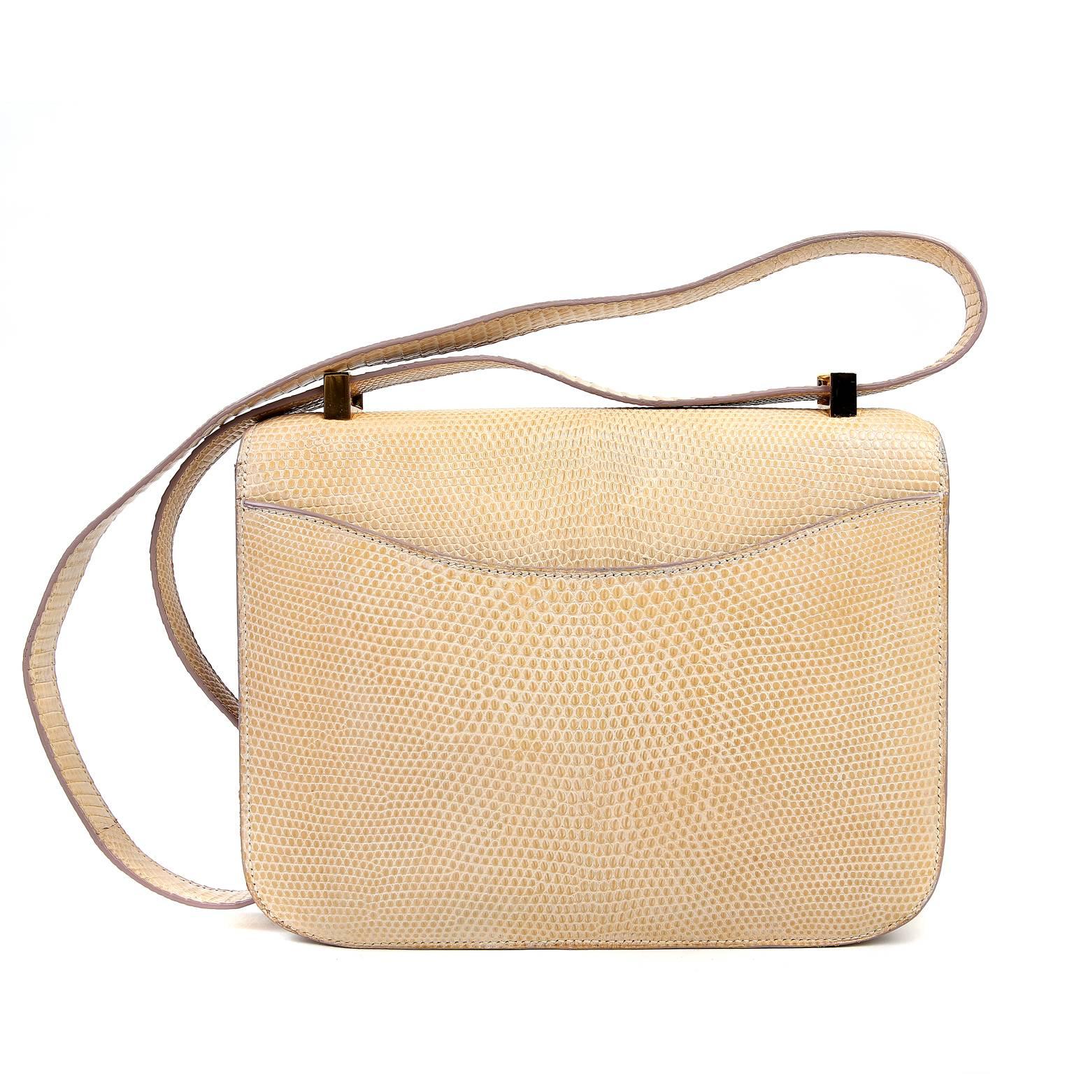 This Authentic Hermès Beige Lizard 23 cm Constance is in excellent condition. One of Jackie-O.’s favorite Hermès styles, she was often photographed wearing a Constance from her vast collection.  The exotic versions of the Constance are extremely