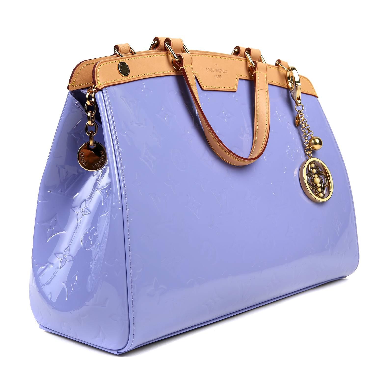 Louis Vuitton Lavender Vernis Leather Brea MM -PRISTINE; appears never before carried.  The classic silhouette is perfectly scaled for every day enjoyment. 
Lavender monogram Vernis leather satchel is trimmed with natural cowhide.  Zipper top