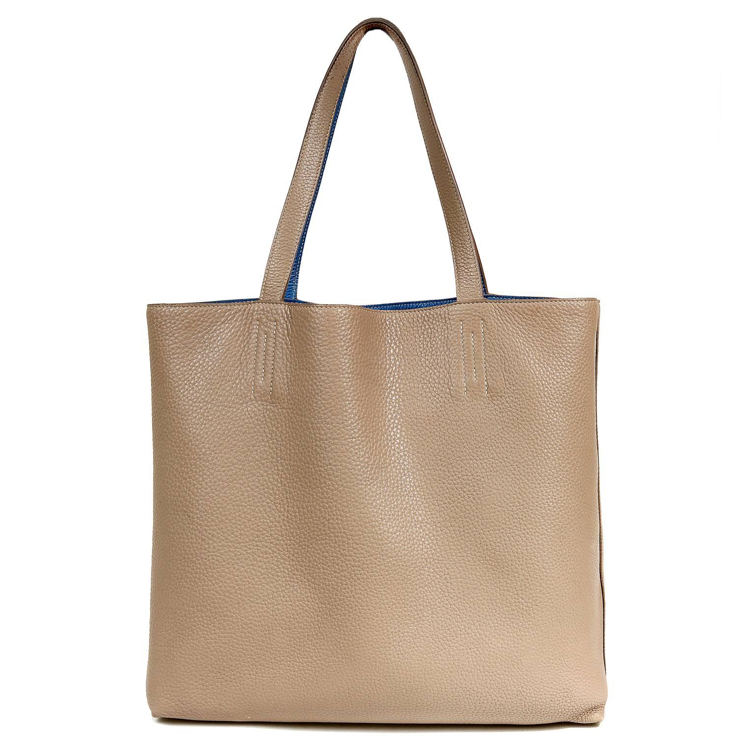Hermès Blue Jean and Etoupe Double Sens PM Tote- EXCELLENT condition  The current style is very versatile thanks to its reversible nature.

Blue Jean and neutral Etoupe large tote is created in Clemence leather.    Textured and scratch resistant,