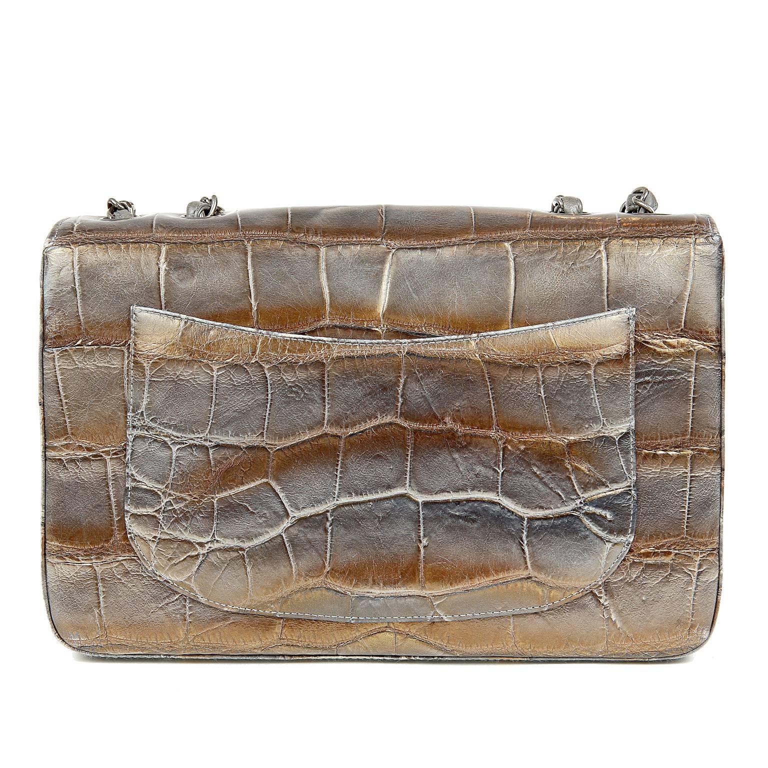 Chanel Pewter and Gold Crocodile Jumbo Classic- PRISTINE
 The striking combination of two tone metallic on crocodile skin is breathtaking; a must have for collectors. 

Single flap classic style in stunningly subtle pewter and gold crocodile skin. 
