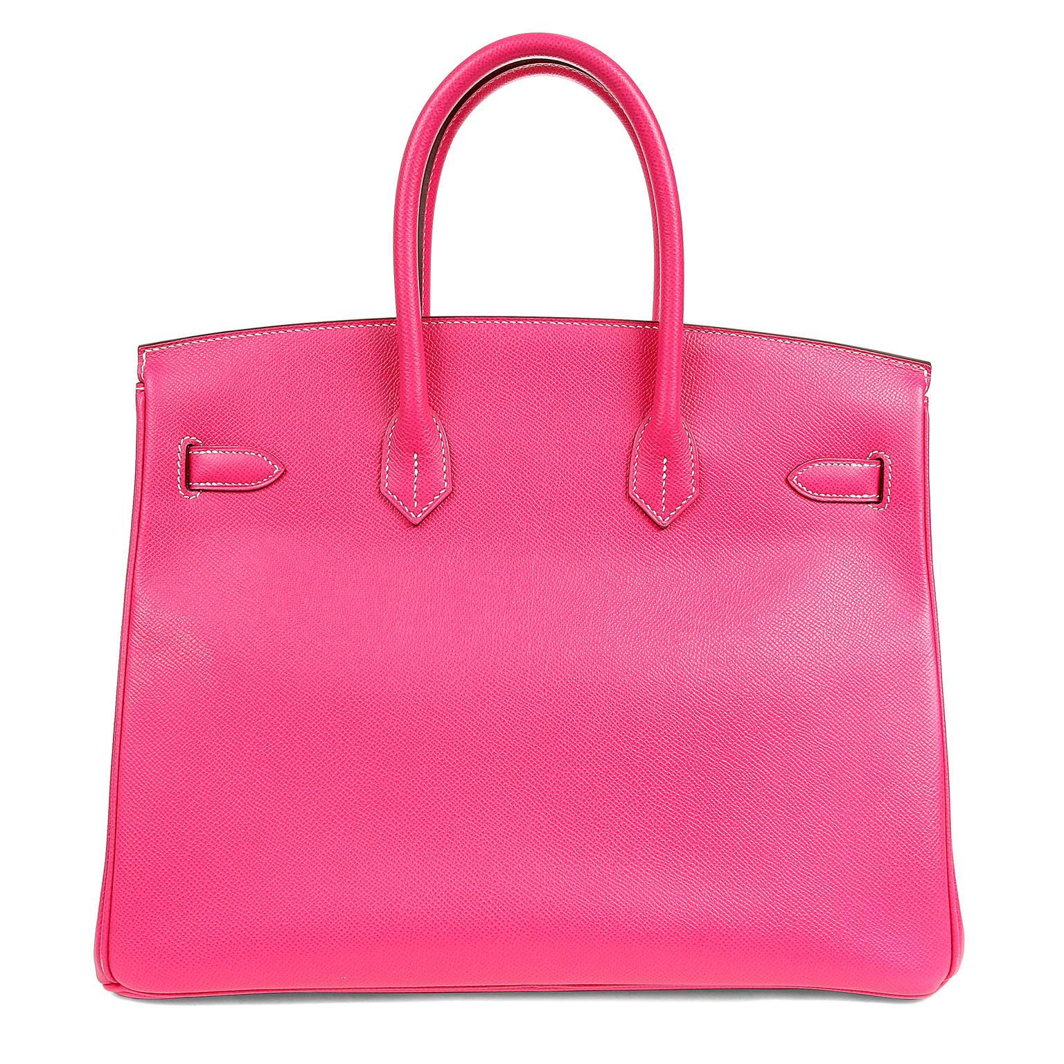 Hermès Rose Tyrien Epsom 35 cm Birkin Bag- Pristine Condition; the protective plastic is still intact on the hardware.   
 The Hermès Birkin is considered the ultimate luxury item.  Hand stitched by skilled craftsmen, wait lists of a year or more