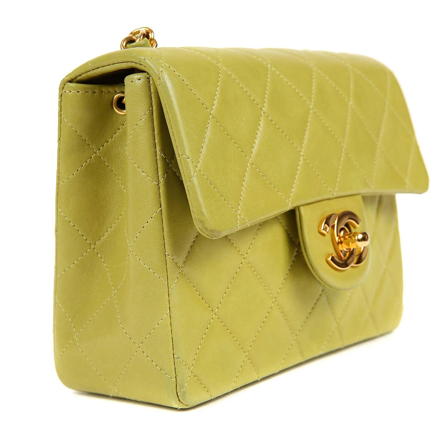 Chanel Chartreuse Lambskin Mini Classic- EXCELLENT PLUS
  Perfect for carrying just the essentials, the hands-free style has an extra-long strap for cross body wear. 

Remarkably neutral chartreuse green lambskin is quilted in signature Chanel