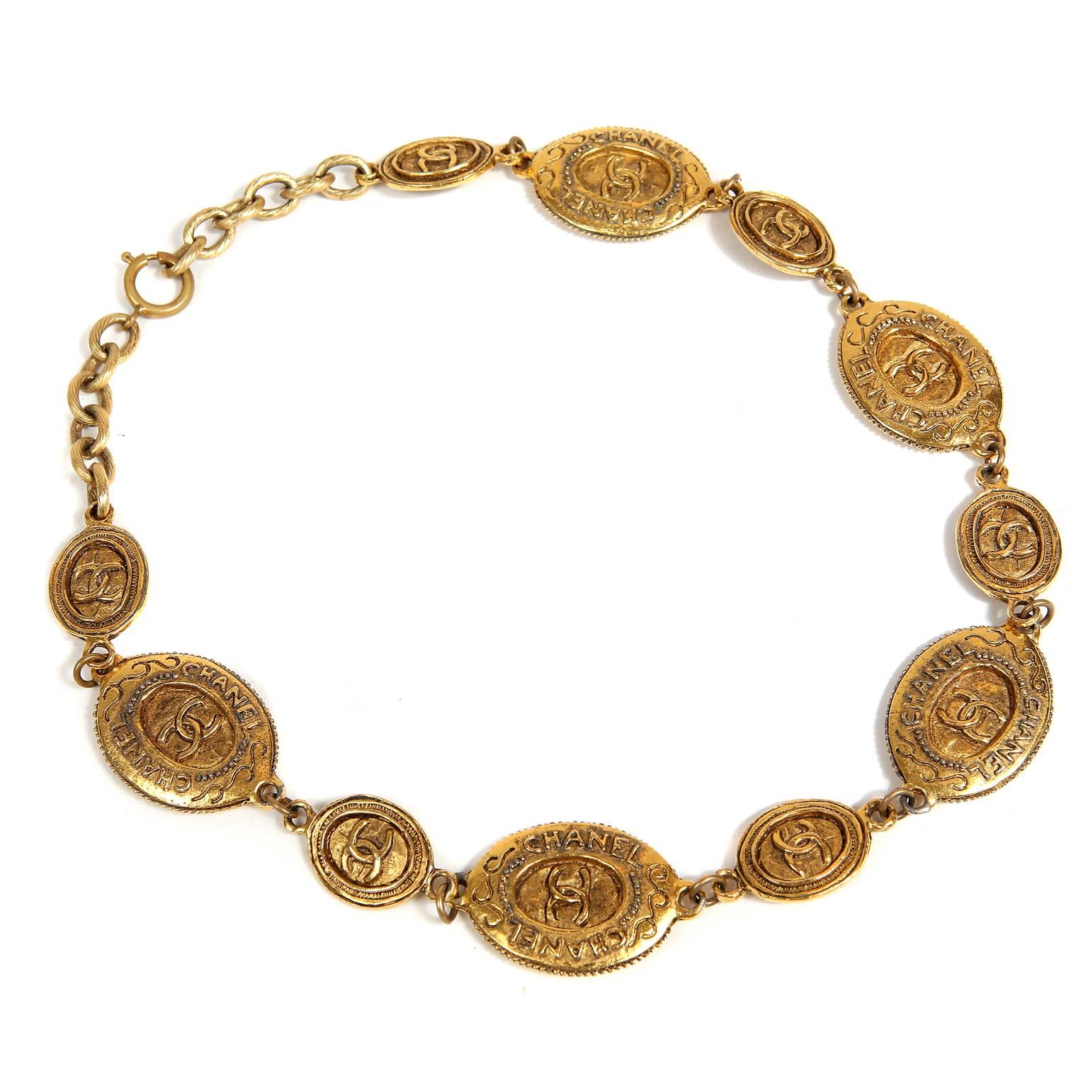 Chanel Oval Coin Necklace- PRISTINE
  Worn with everything from t- shirts to gowns, this elegant piece is a must have for any collection.

Antiqued gold oval coins in alternating sizes.  Interlocking CC design.  Adjustable length clasp closure. 