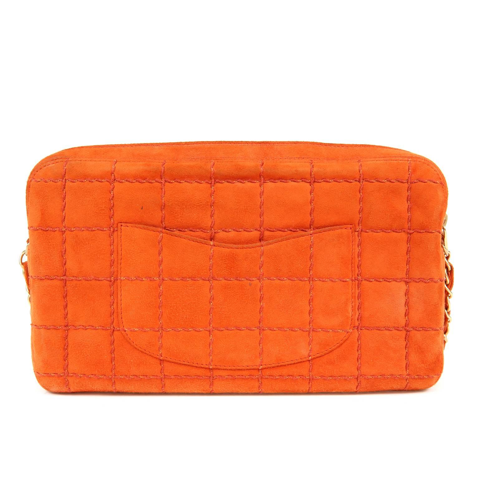 Chanel Orange Suede Medium Camera Bag- EXCELLENT
Vibrant orange suede adds interest to any outfit and is complementary with all the neutrals.  Twisted thread overlay creates a square quilted pattern.  Matte gold hardware and zip top closure.  Orange