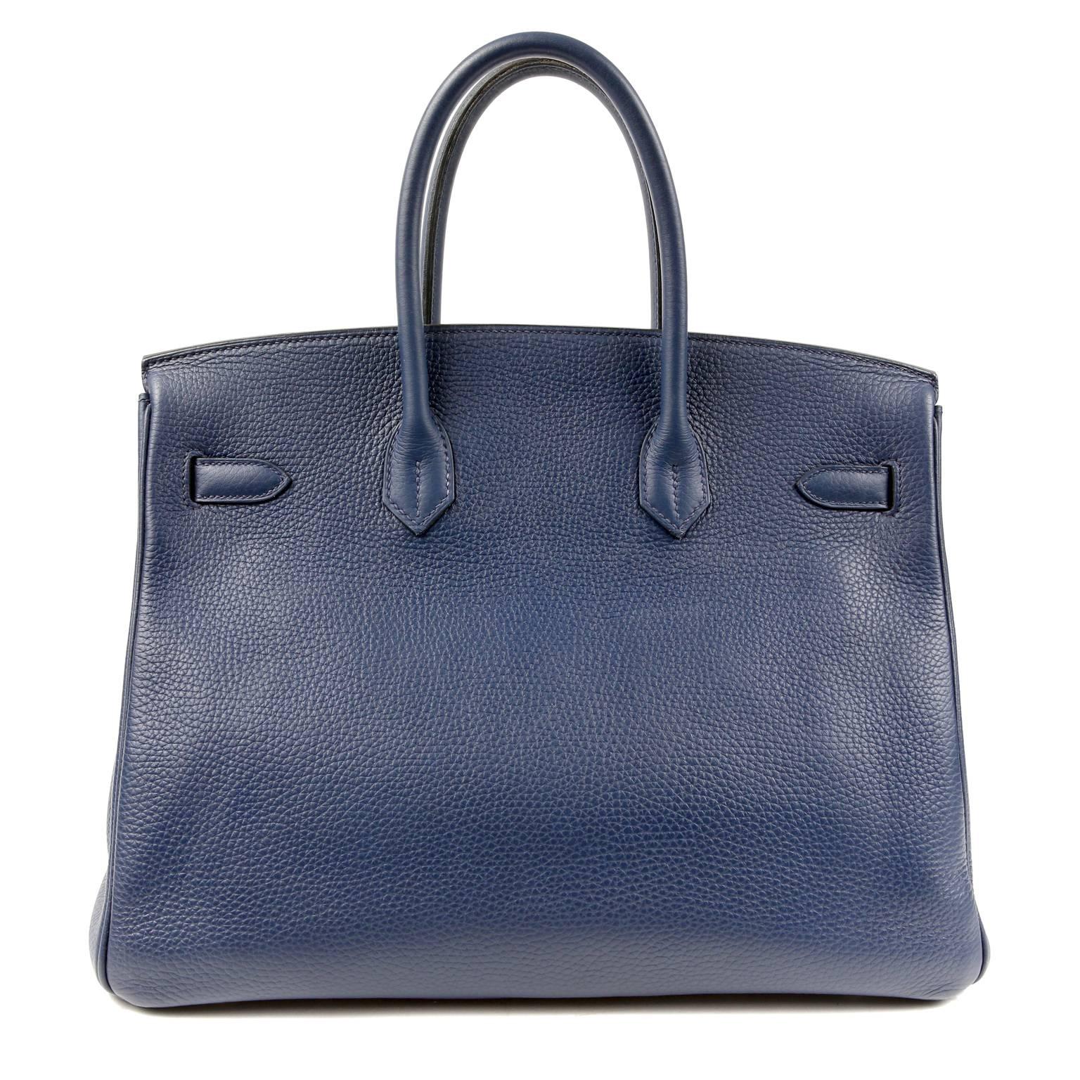 Hermès Indigo Togo 35 cm Birkin Bag- PRISTINE
 Hand stitched by skilled craftsmen, wait lists of a year or more are commonplace for the Hermès Birkin. They are considered the ultimate in luxury fashion. Indigo is a deep dark blue- perfectly wearable