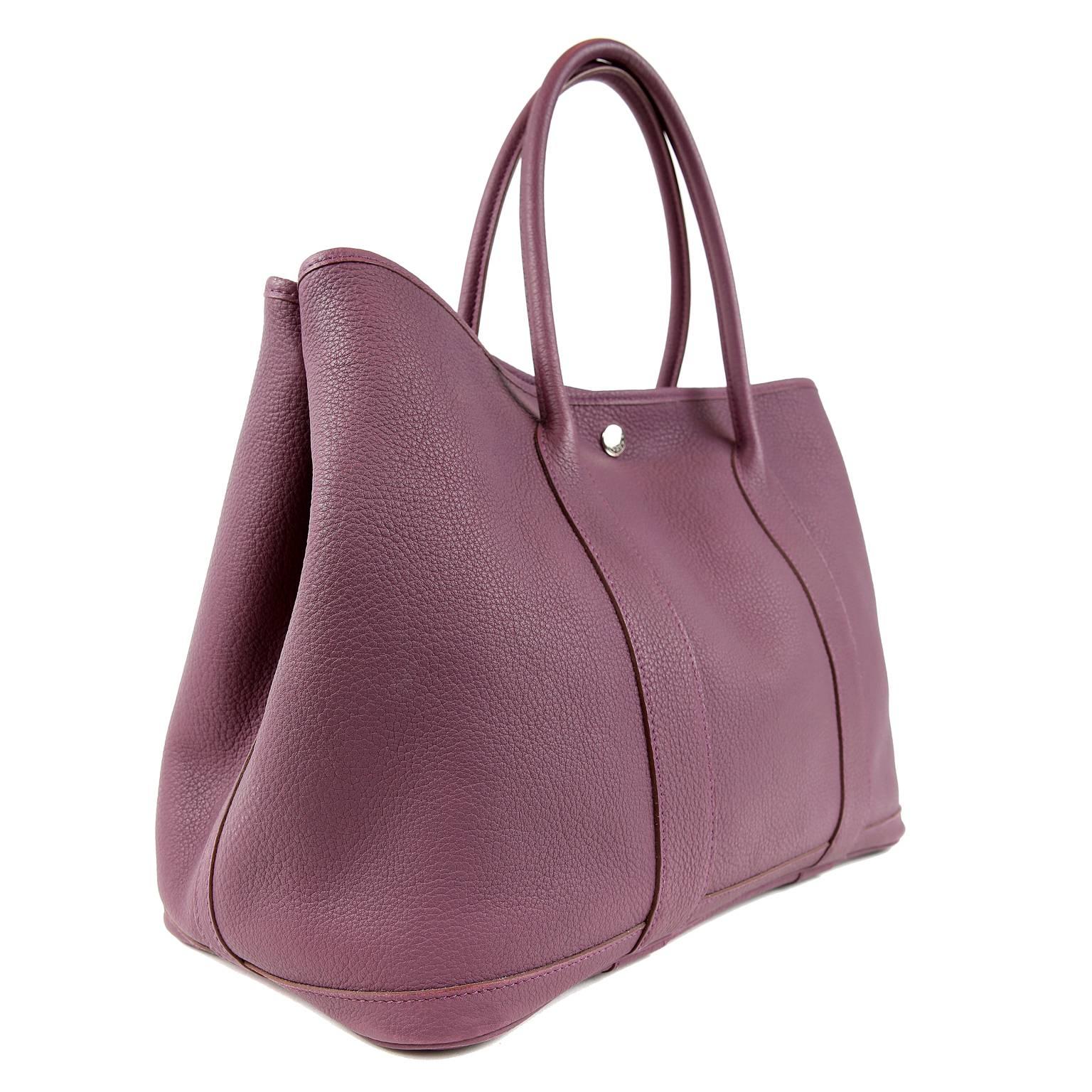 Hermès Violet All Leather Garden Party Tote- Nearly Pristine
  With an adjustable silhouette and understated panache, the Garden Party is a favorite among Hermès lovers. 

Pretty Violet Togo leather with Palladium hardware clou de selle snaps.  Side