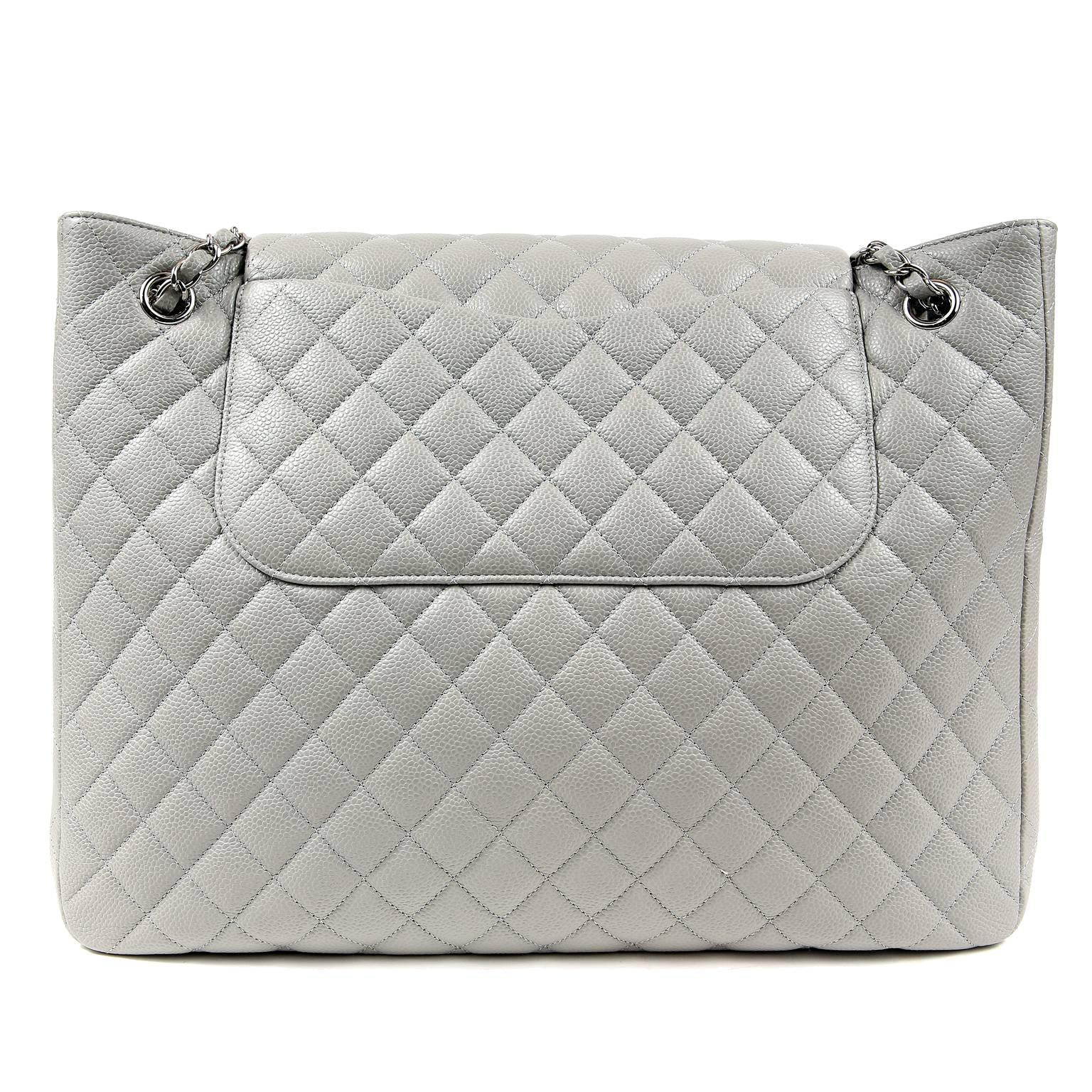 Chanel Grey Caviar Leather Tote- PRISTINE!
  The classic style has a unique flap closure concealing a roomy pocket for essential items. 

Durable and textured grey caviar leather is quilted in signature Chanel diamond pattern.  Large flap over