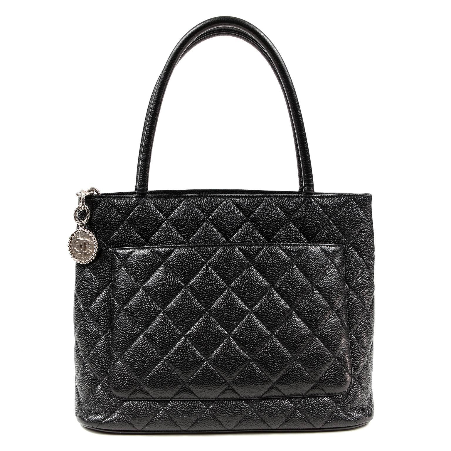 Chanel Black Caviar Medallion Tote is in excellent plus condition.  One of the classics, the Medallion Tote holds its value and is a consistent favorite among Chanel lovers. 

Durable and textured black caviar leather is quilted in signature Chanel