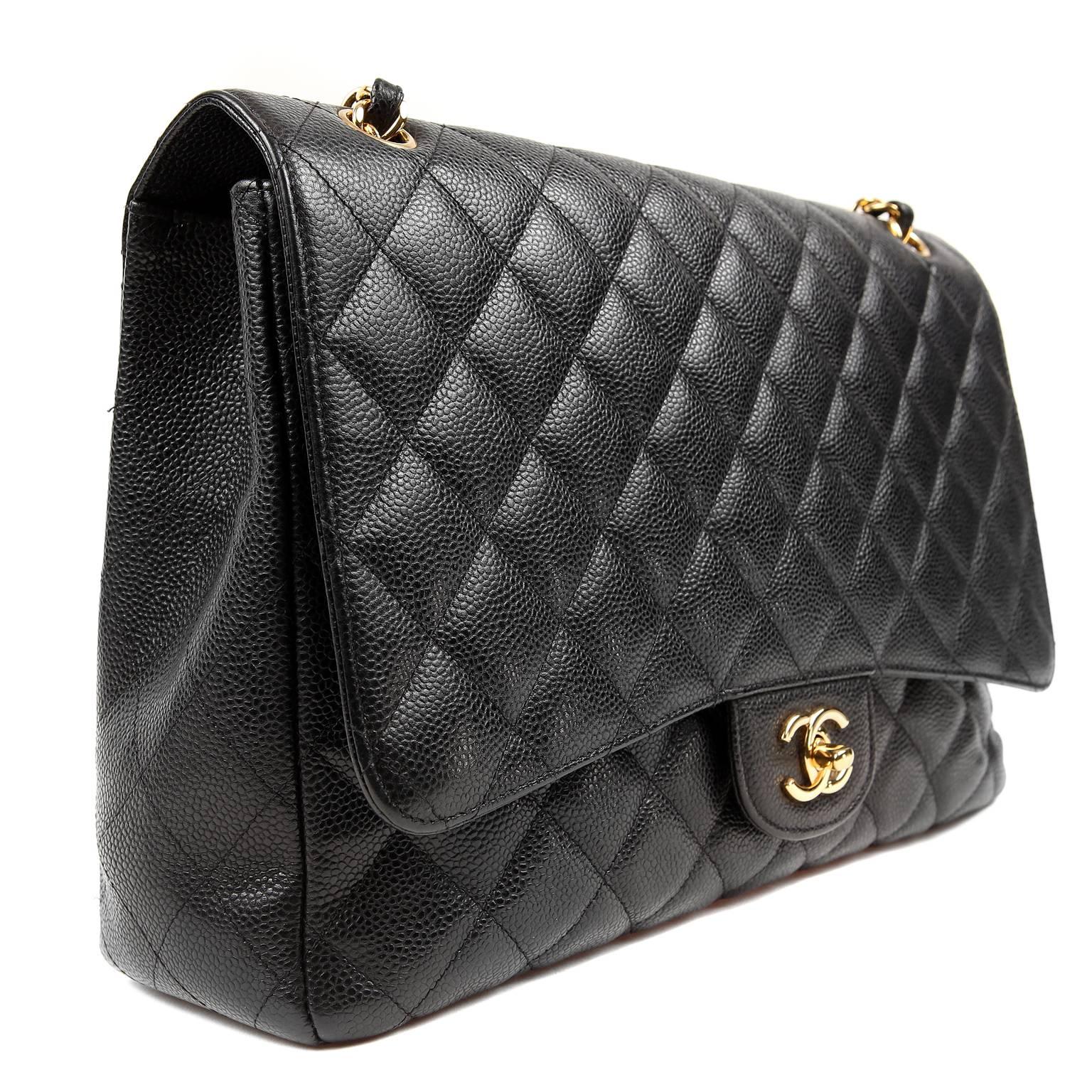 Chanel Black Caviar Maxi Flap with Gold Hardware In Excellent Condition In Malibu, CA