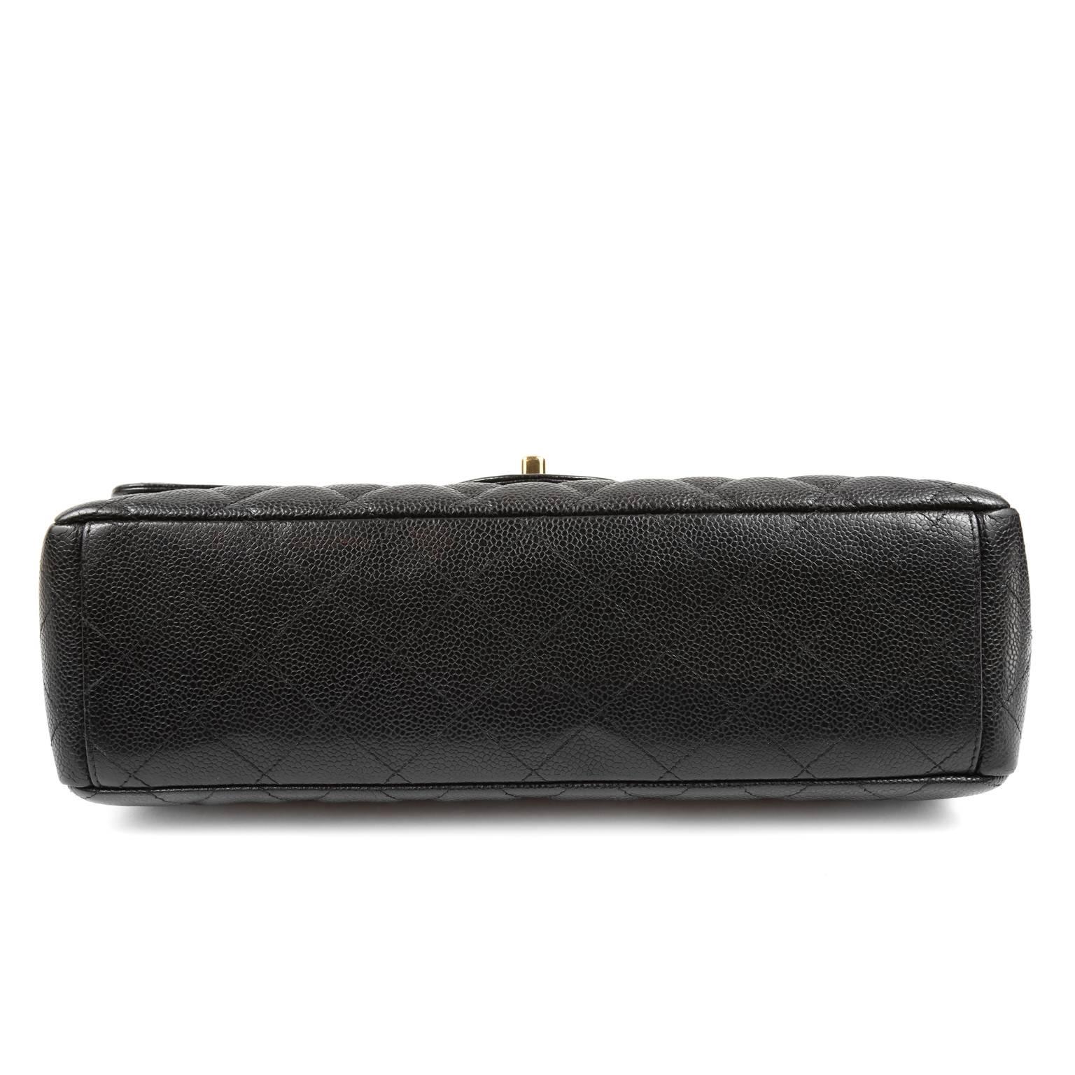 Women's Chanel Black Caviar Maxi Flap with Gold Hardware