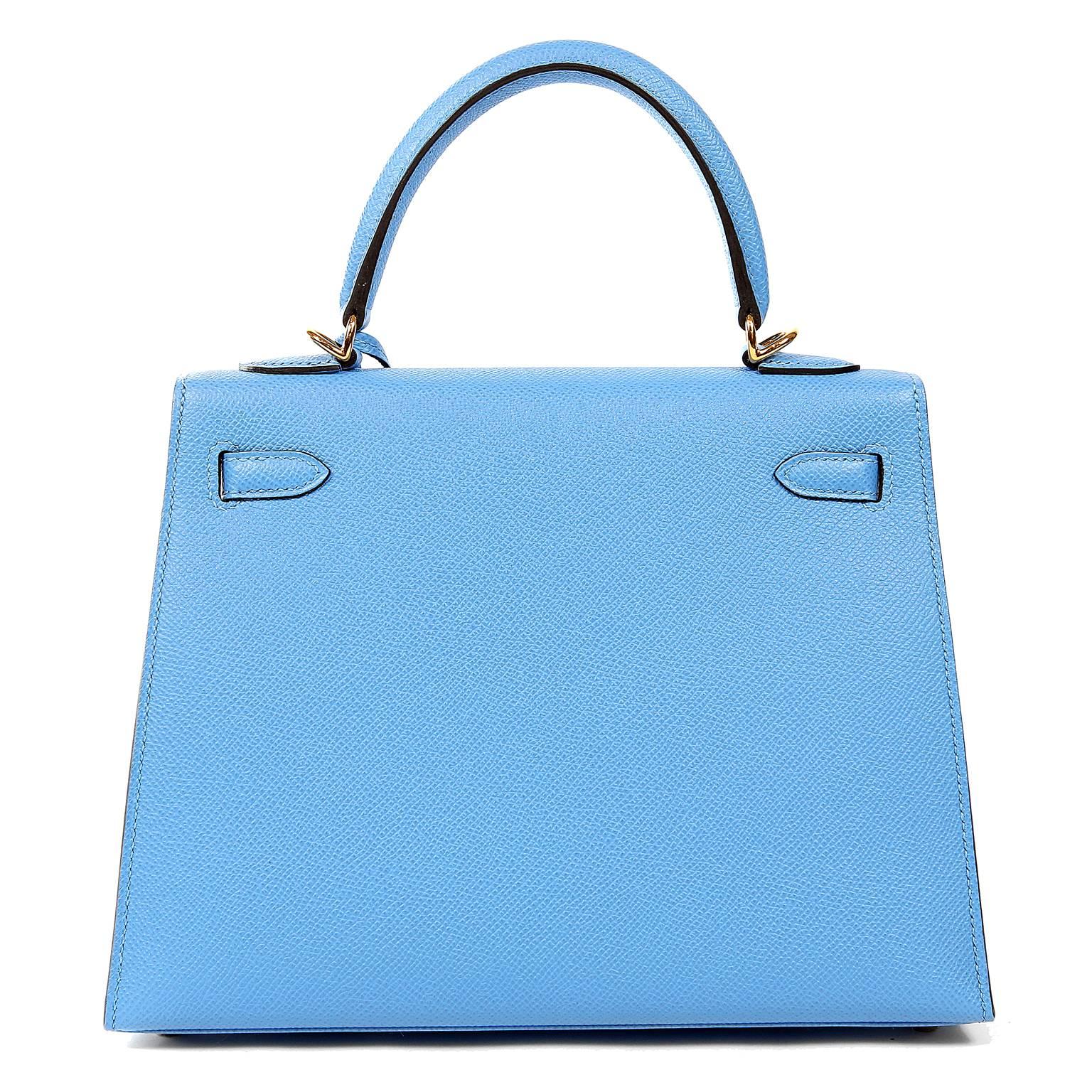 This authentic Hermès Blue Paradise Epsom 25 cm Kelly Sellier is in pristine condition with the protective plastic intact on the hardware.     Hermès bags are considered the ultimate luxury item worldwide.  Each piece is handcrafted with waitlists