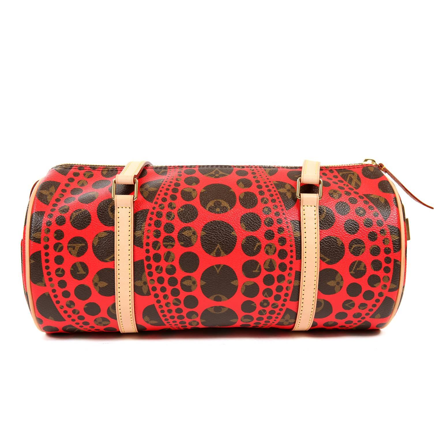 This authentic Louis Vuitton Neo Pumpkin Dots Papillon is a limited edition collectible that has never been carried- brand new. Designed by artist Yayoi Kusama, it features the signature Louis Vuitton monogram with a unique red dot overlay pattern. 