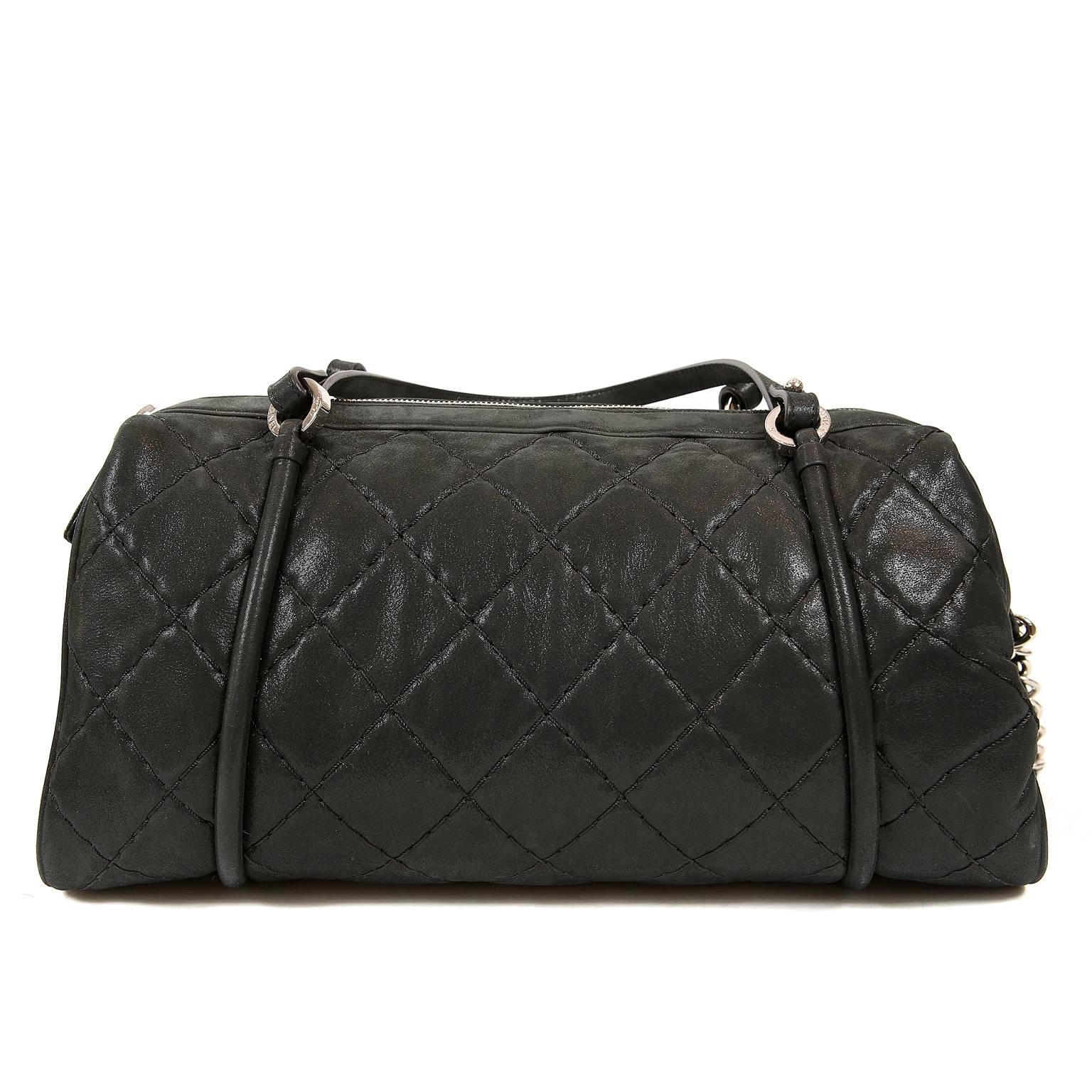 Chanel Black Lambskin Bowler- Pristine, appearing never carried. 
 Perfect for every day, the bowler is a classic silhouette.  The addition of an optional shoulder strap makes it a brilliant addition to any collection.  
Black brushed lambskin is
