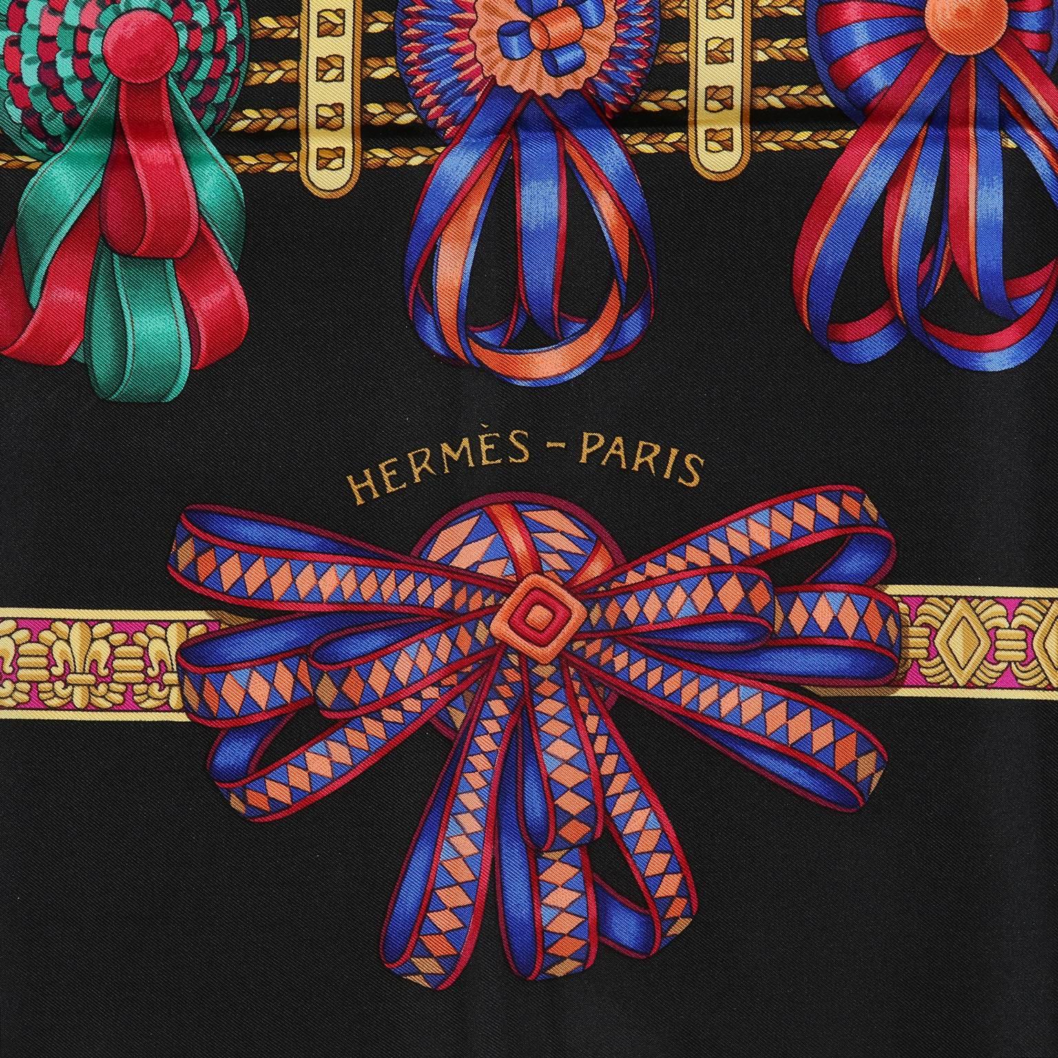 Hermès Black Les Rubans du Cheval 90 cm Silk Scarf- NEW with the original box
  Designed by Joachim Metz, the print features a black background with multicolored horse ribbons.  100% silk.  Made in France. 
A194