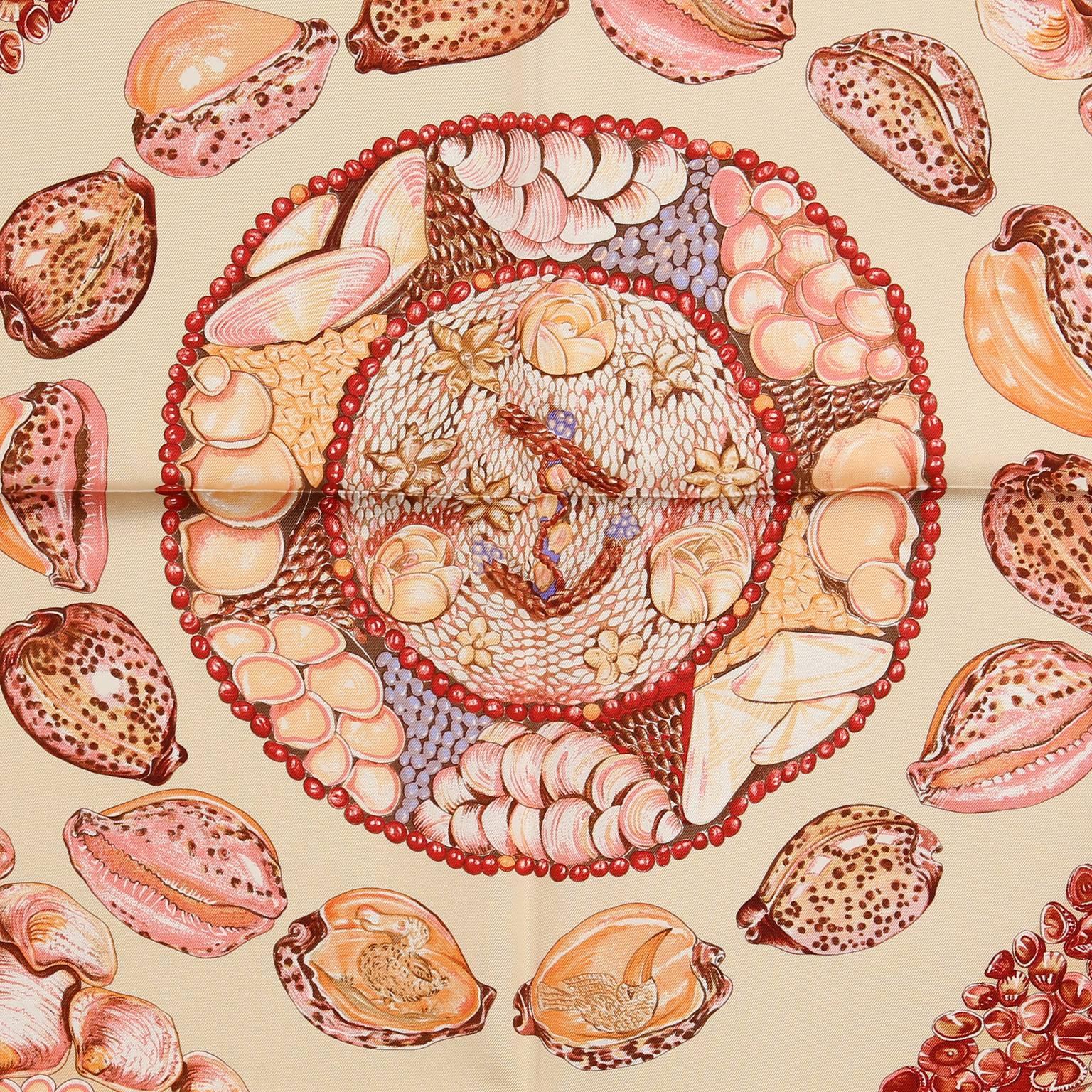  Hermès Ecru Silk Rocaille 90 cm Scarf-  NEW with the original box
 Originally designed by Valerie Dawlat-Dumolin, the print features light beige background with pink and coral colorway.  An artistic ornamental shell and pebble design commemorates