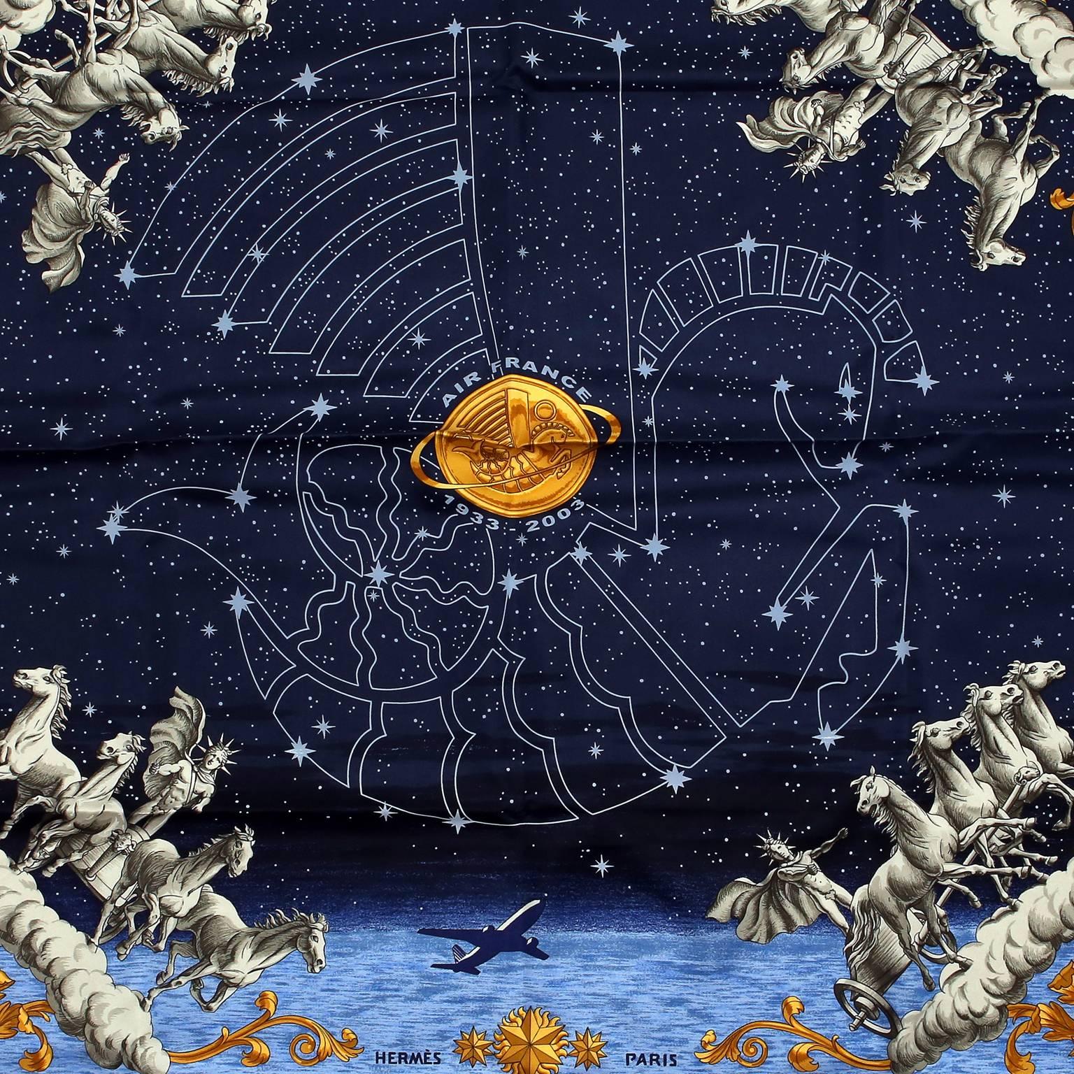 This authentic Hermès Cosmos 90 cm Silk Scarf is new with the original box. Originally designed by Philippe Ledoux in 1964, the print features a midnight blue celestial sky with a hippocampus constellation.  The Limited Edition reissue design