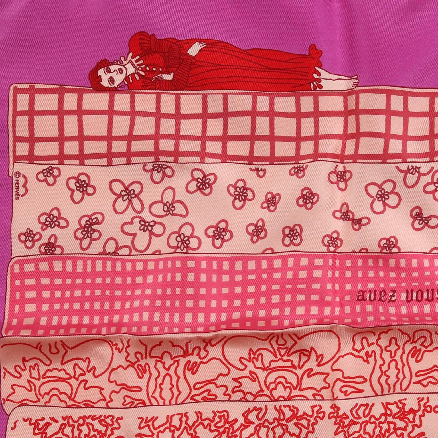 This authentic Hermès Pink Avez Vous Bien Dormi Silk Pochette Scarf is new with the box.  Designed by Agathe Gonnet in 2010, it depicts a woman resting atop a stack of multi patterned mattresses.  “Did you sleep well?”  100% silk.  Made in France. 