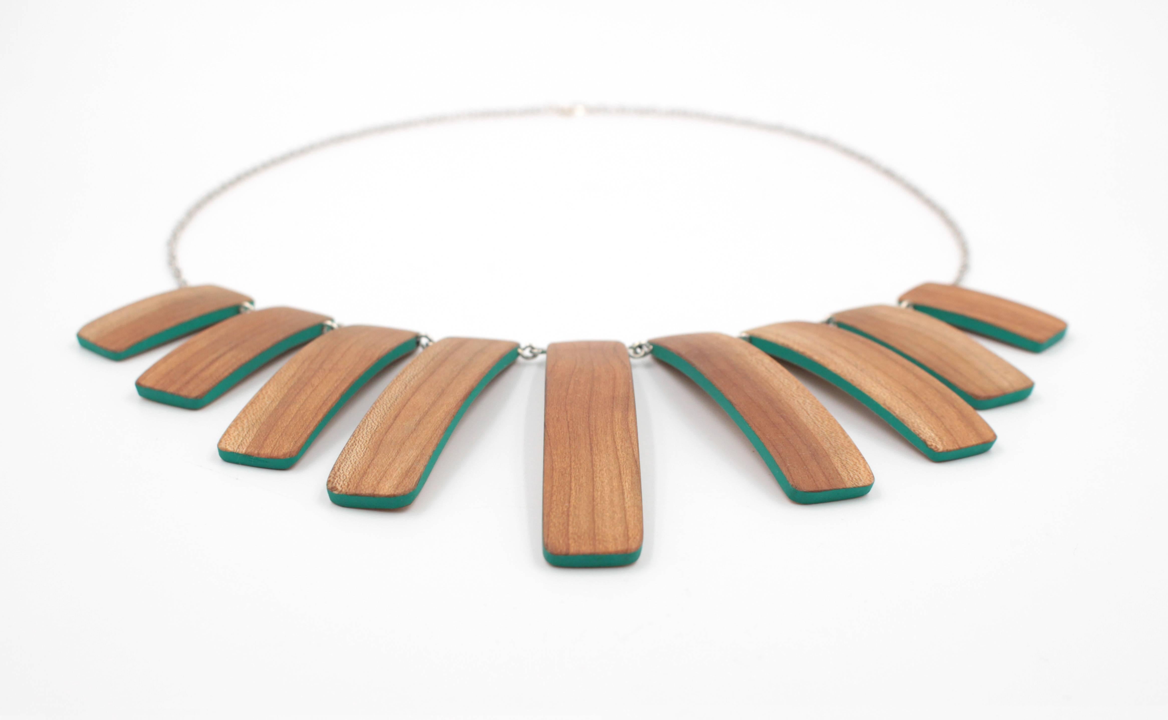 Handmade wooden "ribs" with blue-green accents.