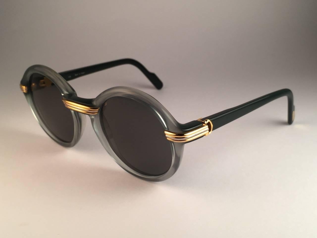New Cartier Cabriolet Round Jade & Gold 49MM 18K Gold Sunglasses France 1990's In New Condition In Baleares, Baleares