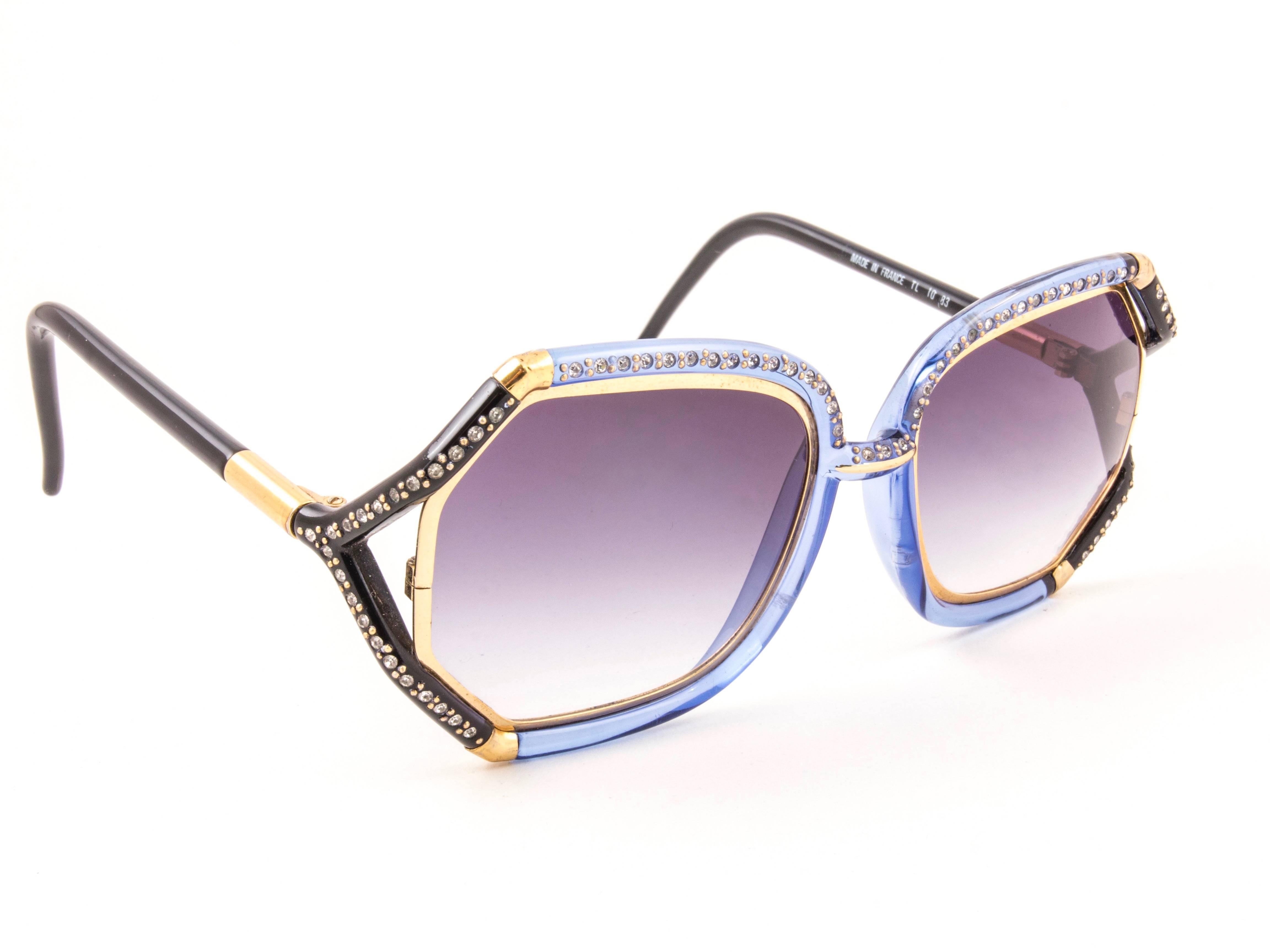New Vintage Ted Lapidus TL 10 83 Strass accents over translucent blue & gold frame with spotless blue gradient lenses.  
Made in Paris.  
Produced and design in 1970's.  
New, never worn or displayed.