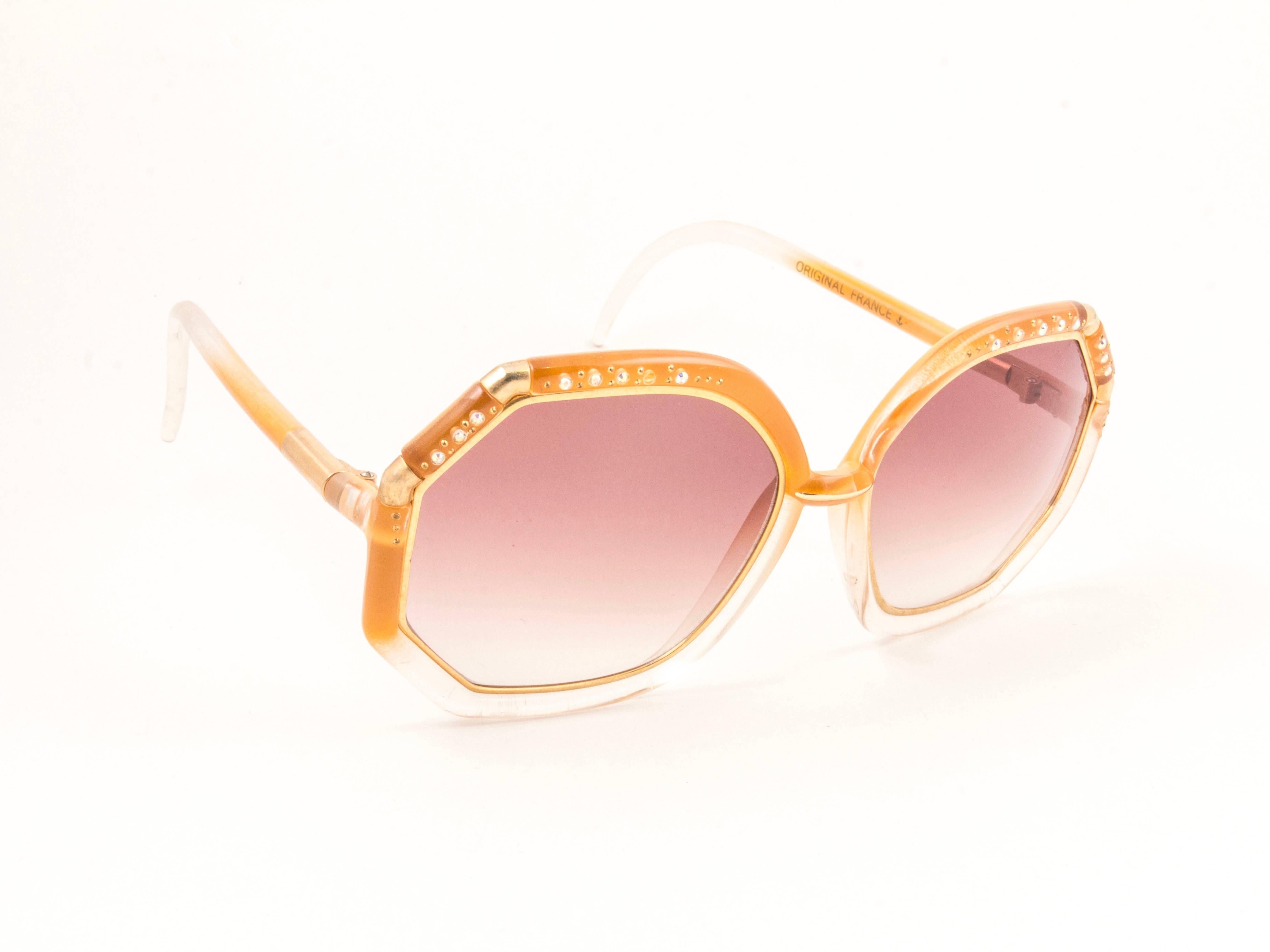 New Vintage Ted Lapidus TL Strass accents over translucent Amber & gold frame with spotless rose gradient lenses.  
Made in Paris.  
Produced and design in 1970's. 
New, never worn or displayed.