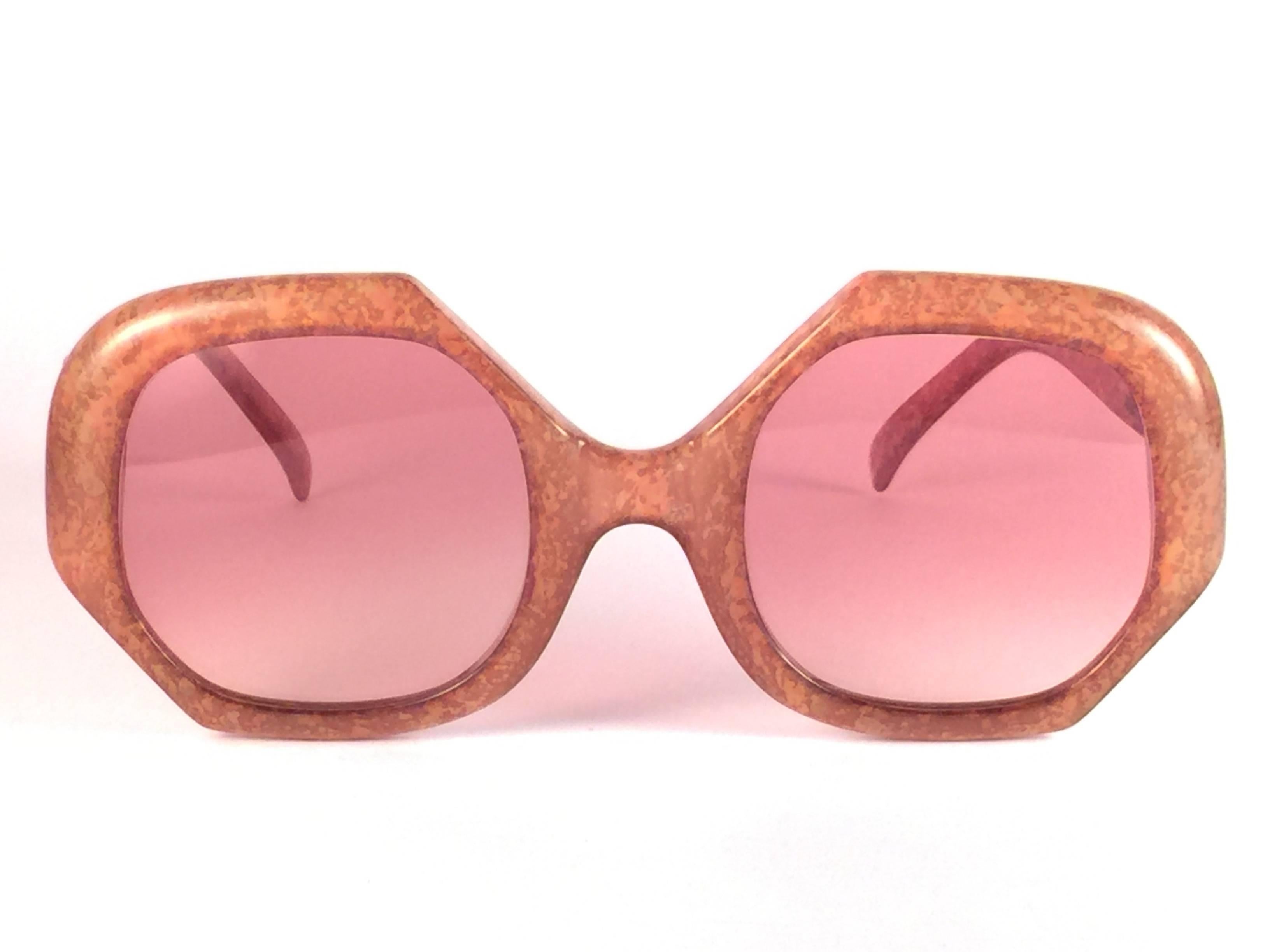 New Vintage Christian Dior 2031 30 Jasped brown frame with spotless light brown lenses.   
Made in Germany.  Produced and design in 1970's.  
A collector’s piece!  New, never worn or displayed. 
Comes with its original silver Christian Dior Lunettes