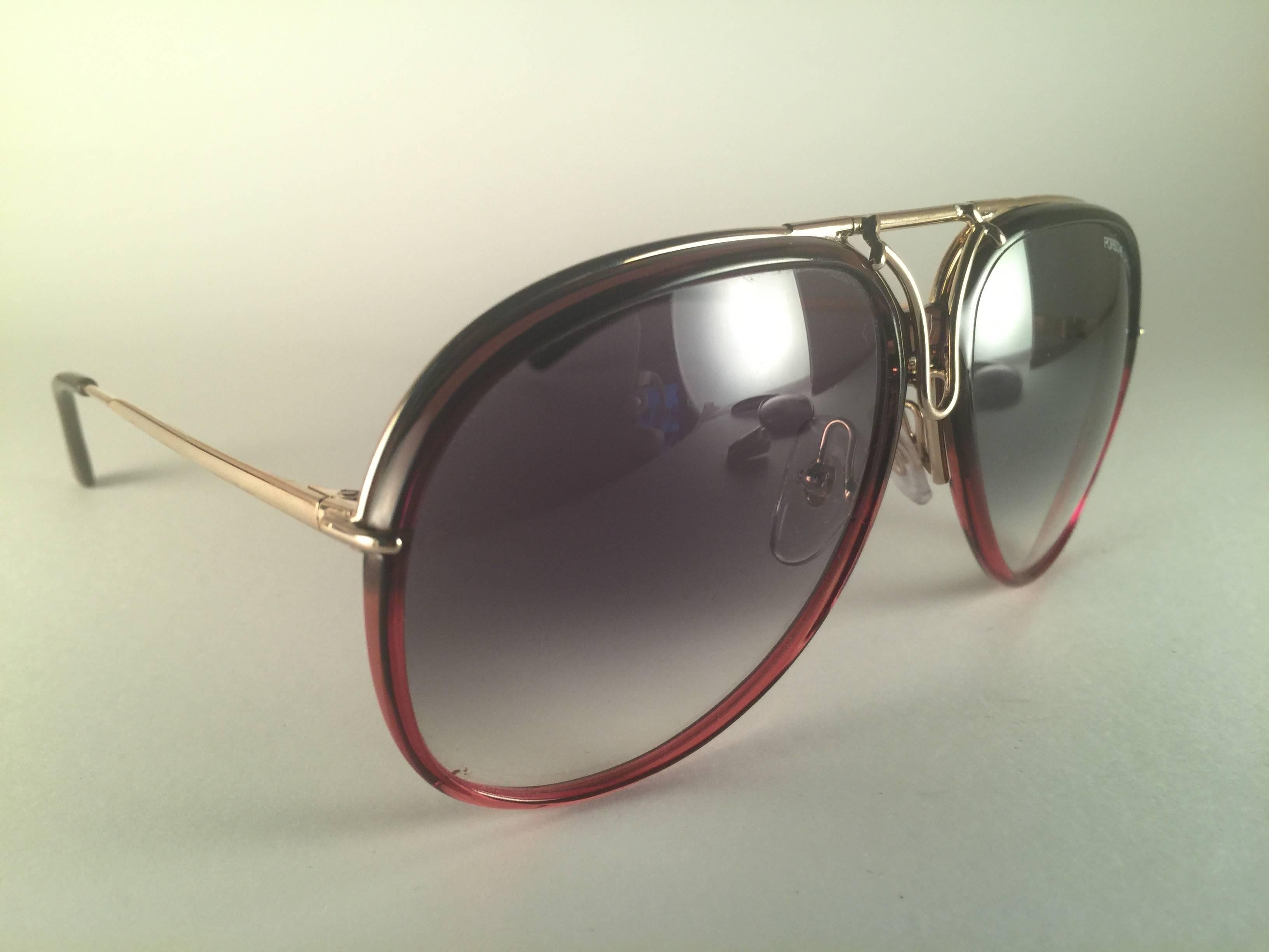 New 1980's Porsche Design 5632 gold frame with interchangeable front, in within seconds it acquire a whole different look. 
Amazing craftsmanship and quality.   
New, never worn. Made in Austria.