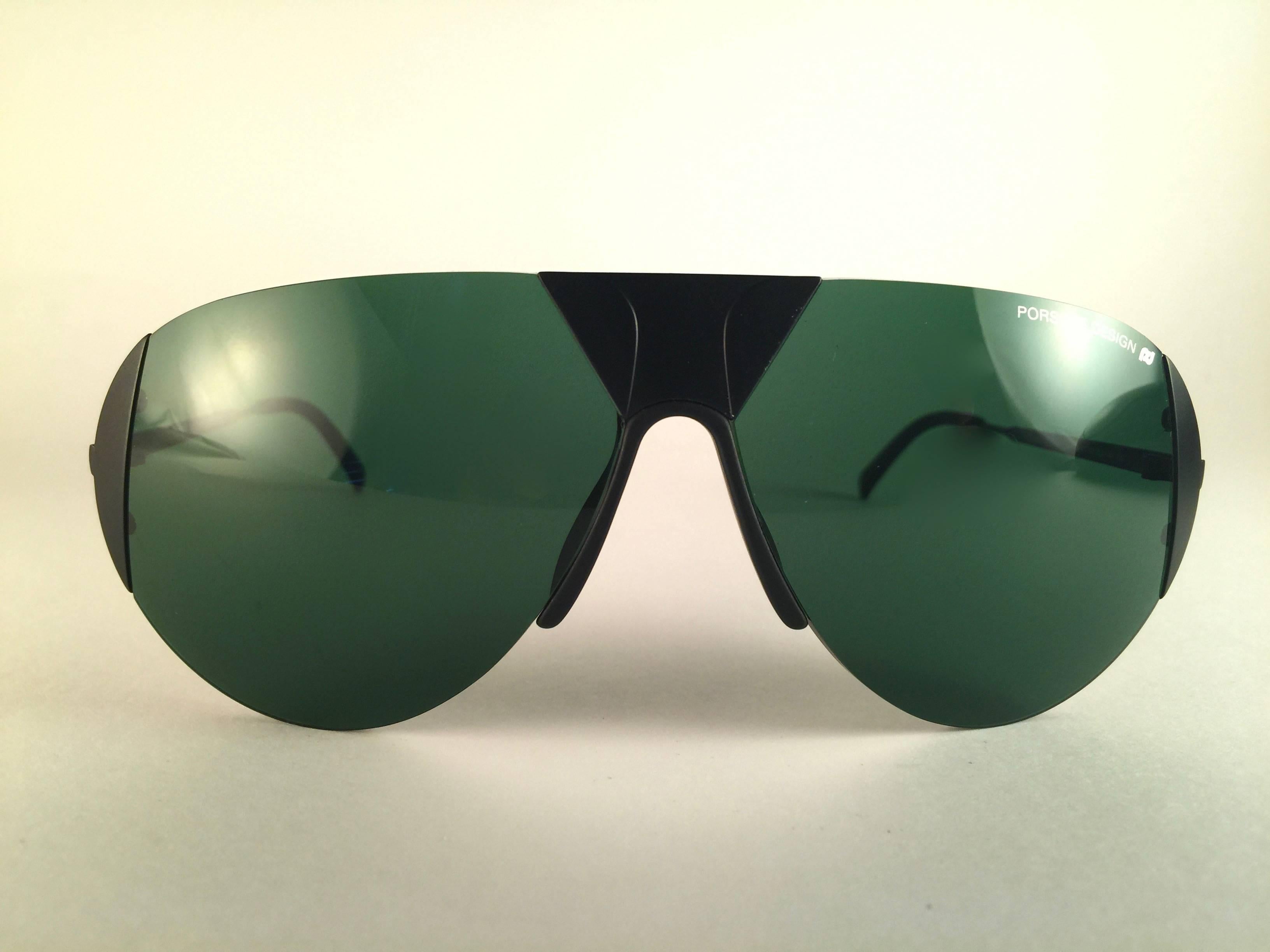 Rare Item.

New 1980's Porsche Design 5636 Black matte frame with deep green lenses.  Amazing craftsmanship and quality.  
Comes with the original Porsche hard case thats has some wear on it due to nearly 40 years of storage.  
New, never worn. Made
