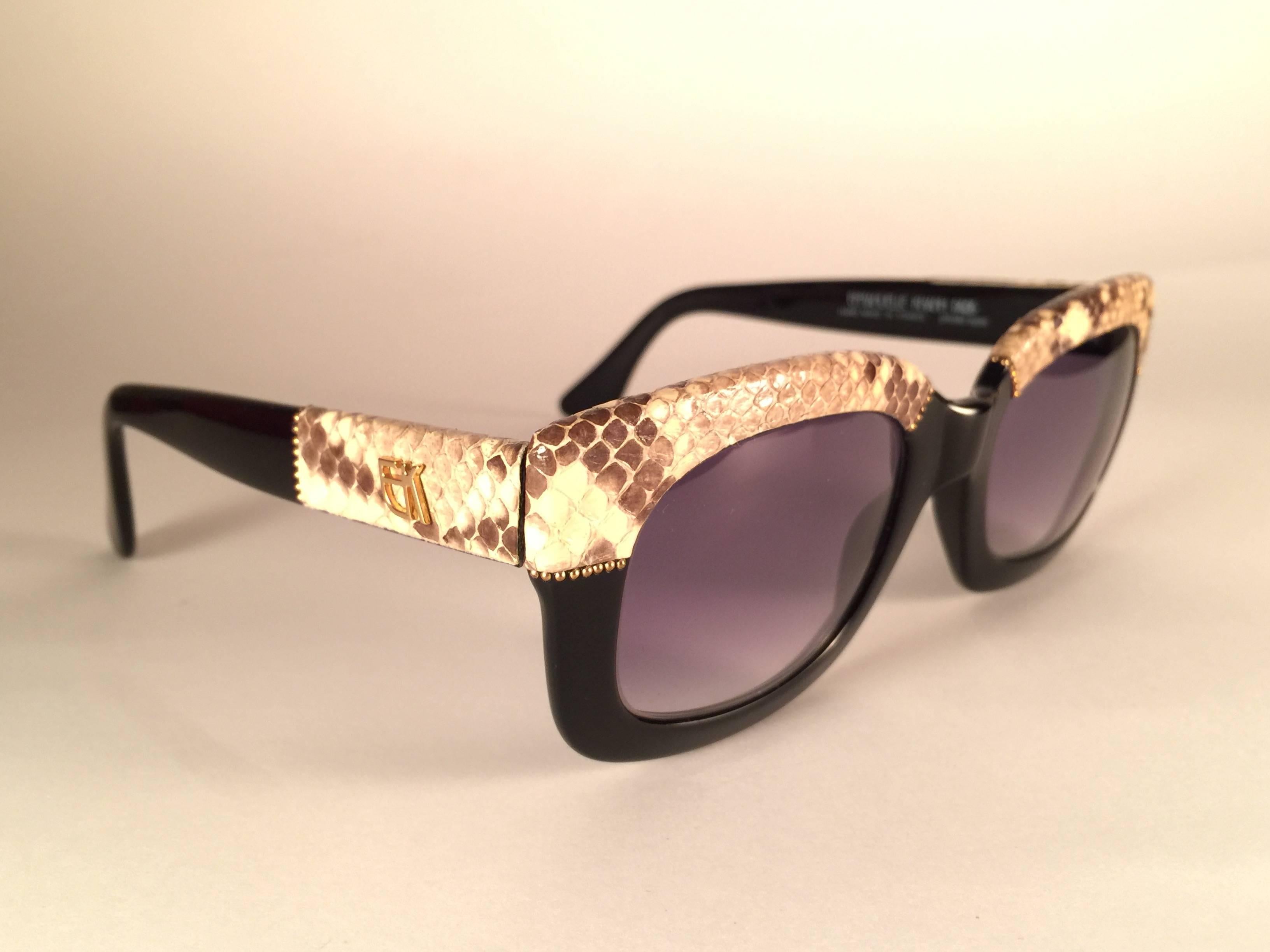 New Vintage Emanuelle Kahn genuine python accents frame with spotless smoke grey gradient lenses. 
Made in Paris. Produced and design in 1980's.  
New, never worn or displayed. Please consider this item is nearly 40 years old and could show minor