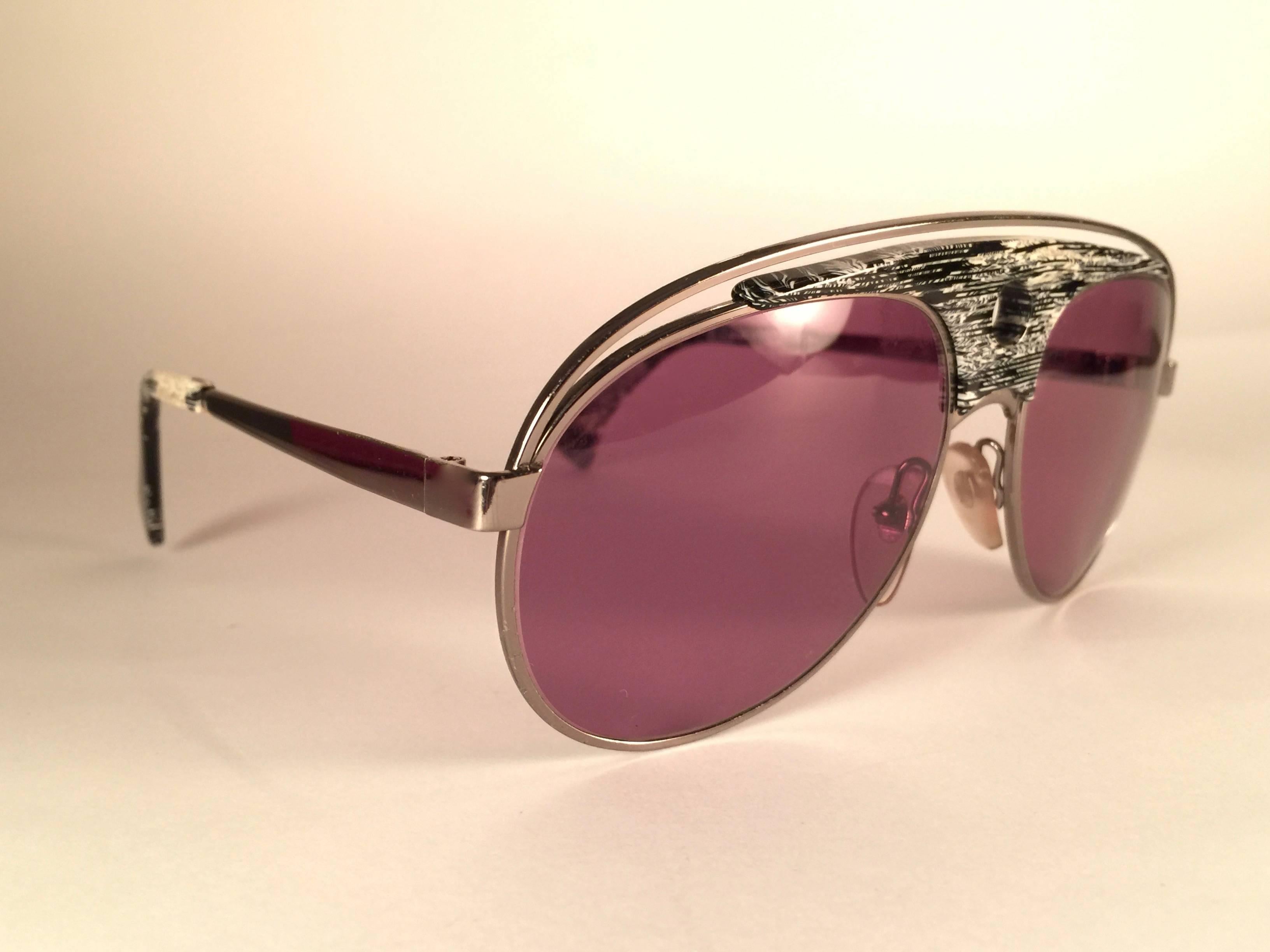 New Vintage Rare Alain Mikli Aviator frame.  
Rare item in new and unworn condition. 
Spotless brown lenses.  
Please consider that this item is nearly 40 years old so it could show minor sign of wear due to storage.  
Made in France.