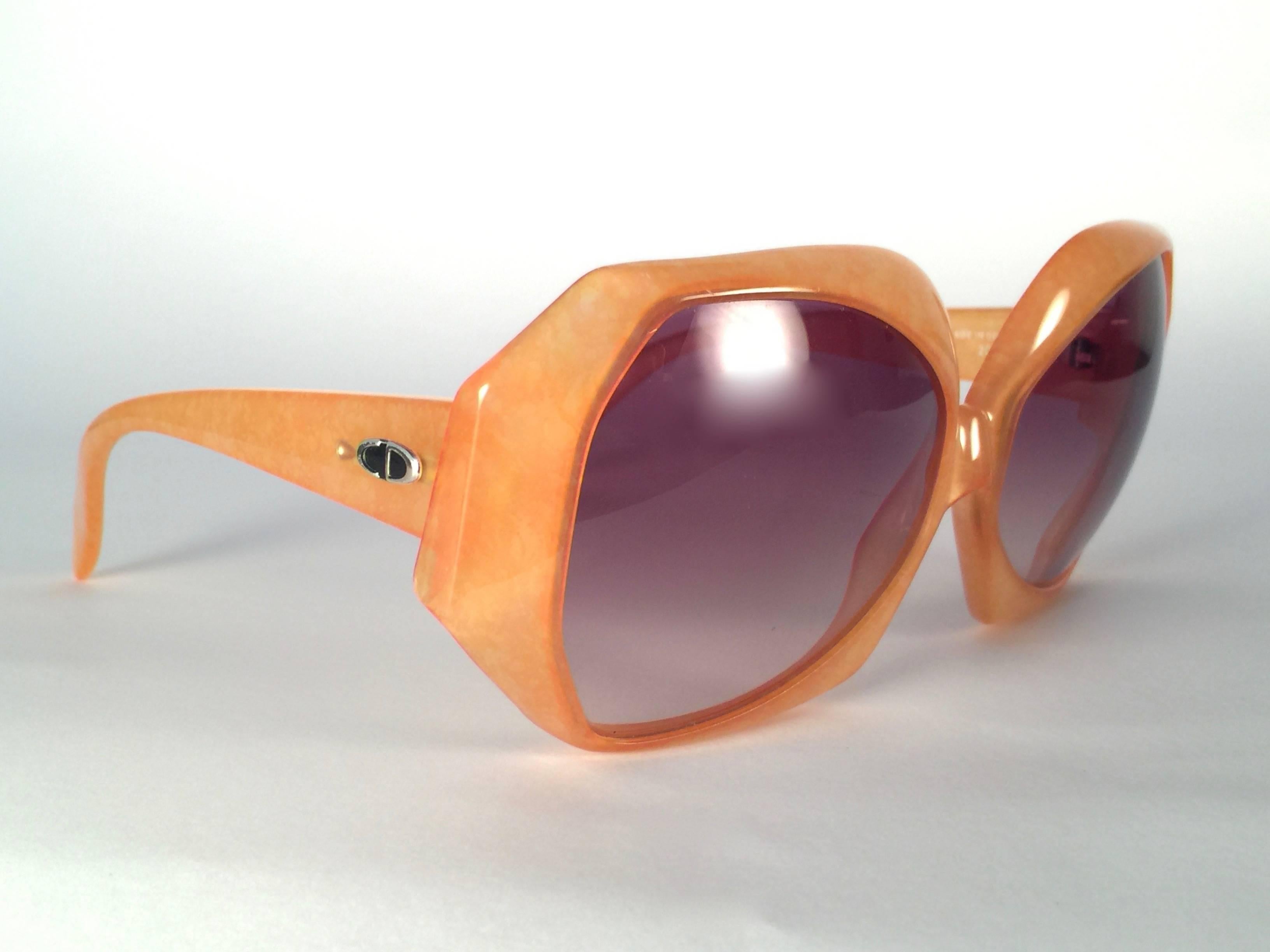 New Vintage Christian Dior 2025 30 Jasped Amber frame sporting light brown gradient lenses.   
Made in Germany.  
Produced and design in 1970's. 
 A collector’s piece!  
New, never worn or displayed. Comes with its original silver Christian Dior
