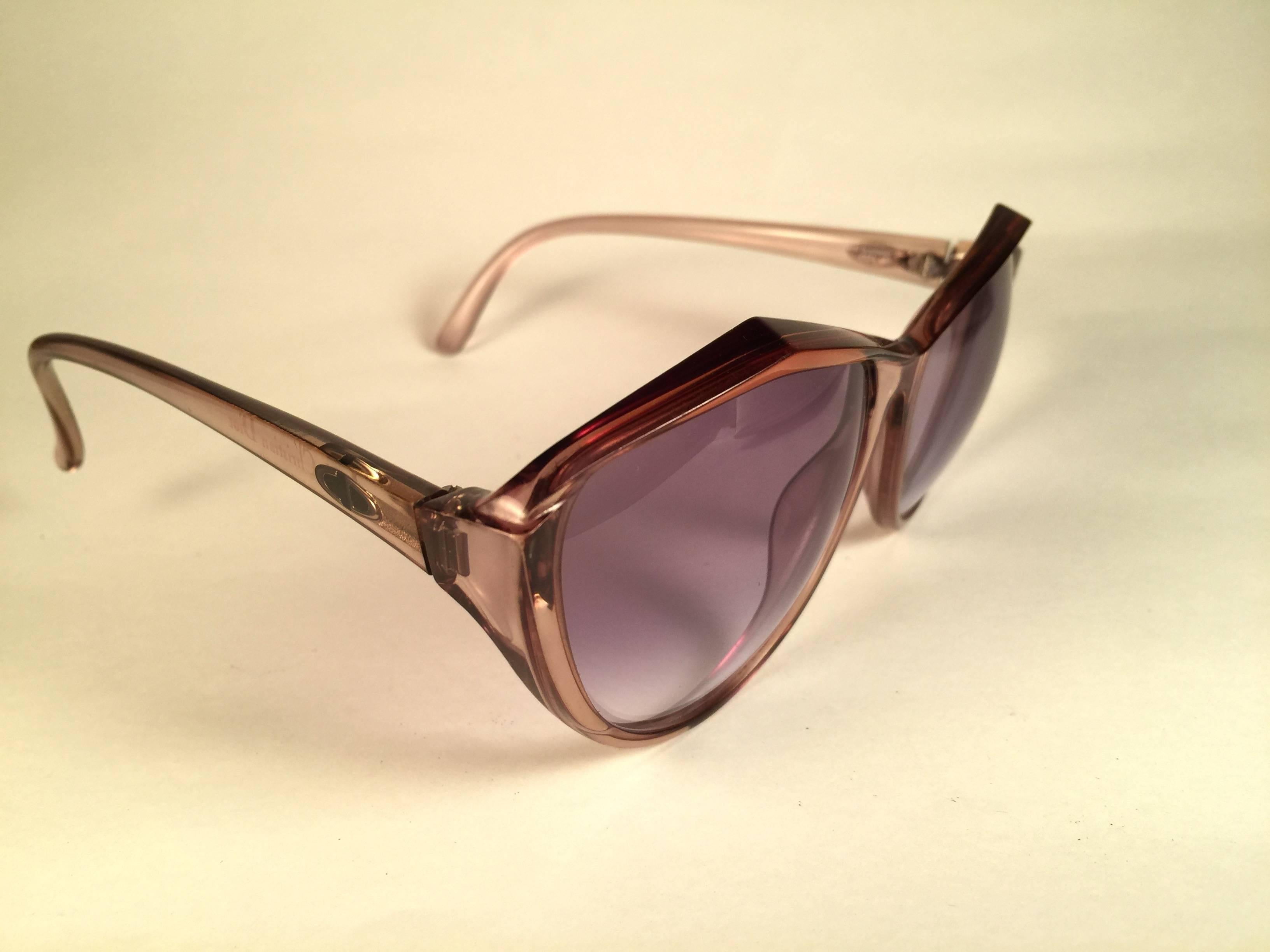 New Vintage Christian Dior 2234 Translucent frame sporting light purple gradient lenses.  
Made in Germany.  Produced and design in 1970's.  A collector’s piece!  
New, never worn or displayed. Please notice this item is nearly 50 years old so it