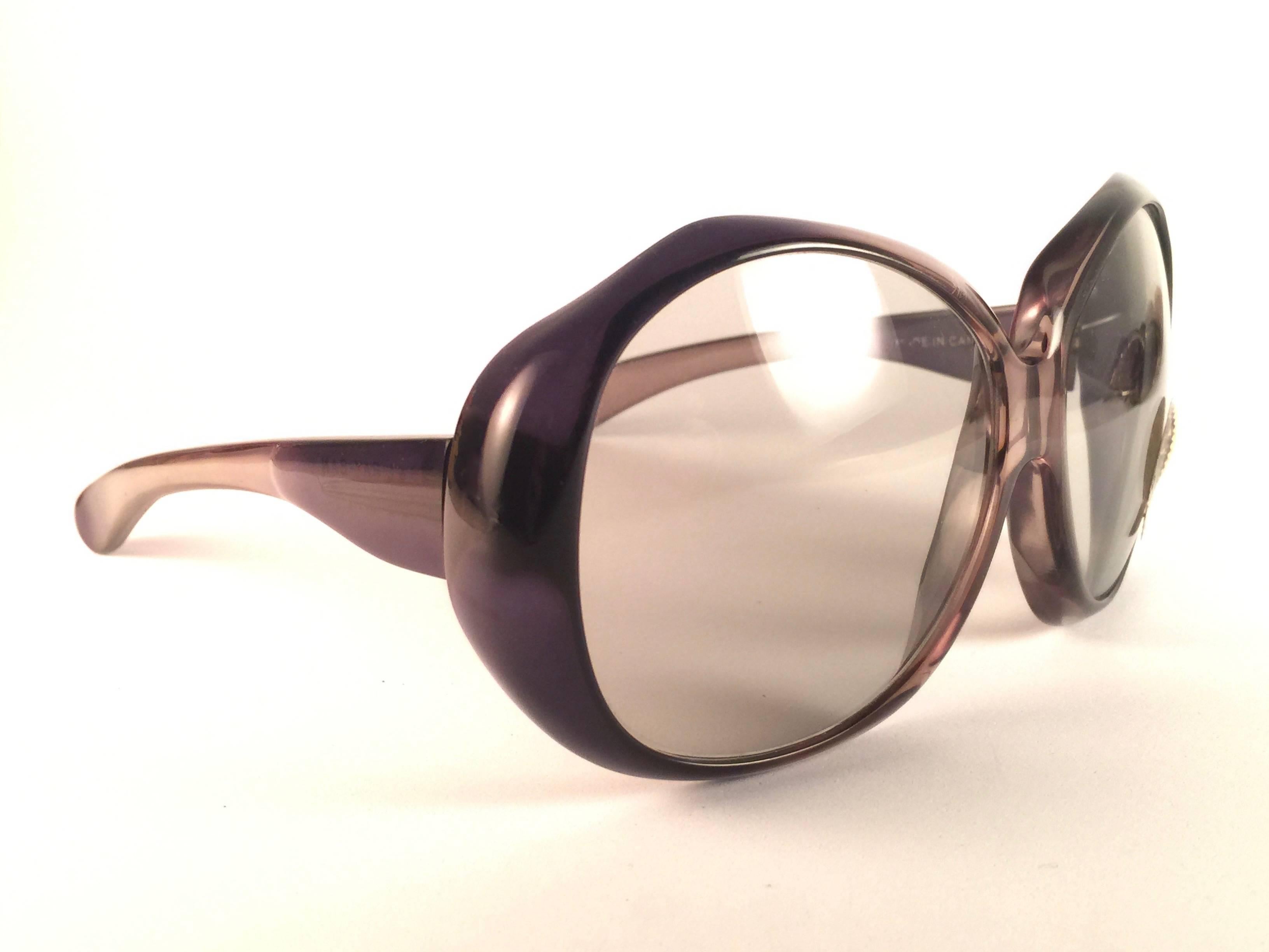 New, clear oversized Ray Ban sunglasses. Original clear lenses. 

Rare pair made in Canada.

New, never worn or displayed.

