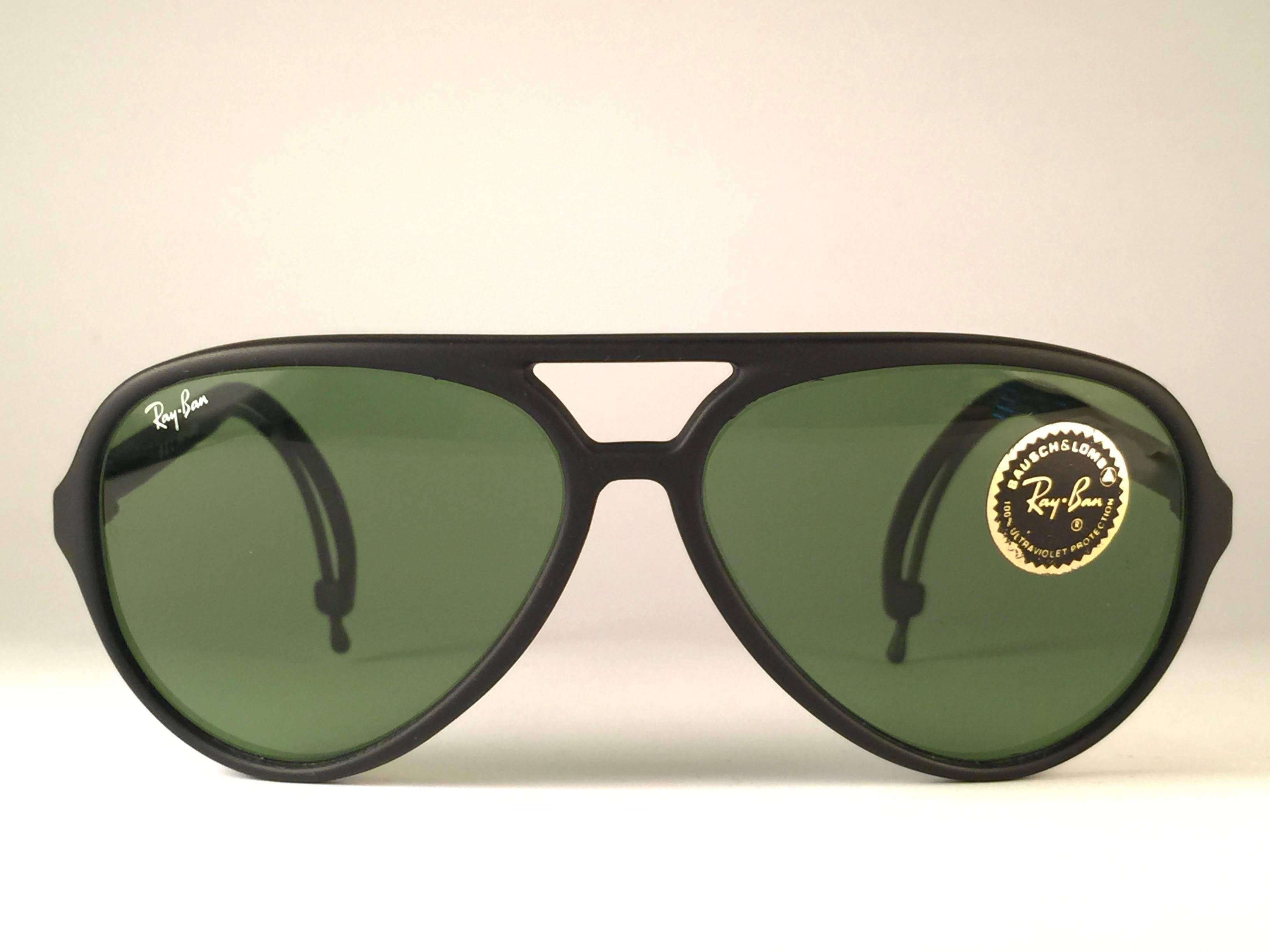 New Rare Vintage Ray Ban Sports Series 4  sunglasses in Black frame.  Lenses are RB3 Green B&L etched in the lenses.   

Comes with its original Ray Ban B&L case.   
This piece may show minor sign of wear due to storage.   
A seldom piece in new,