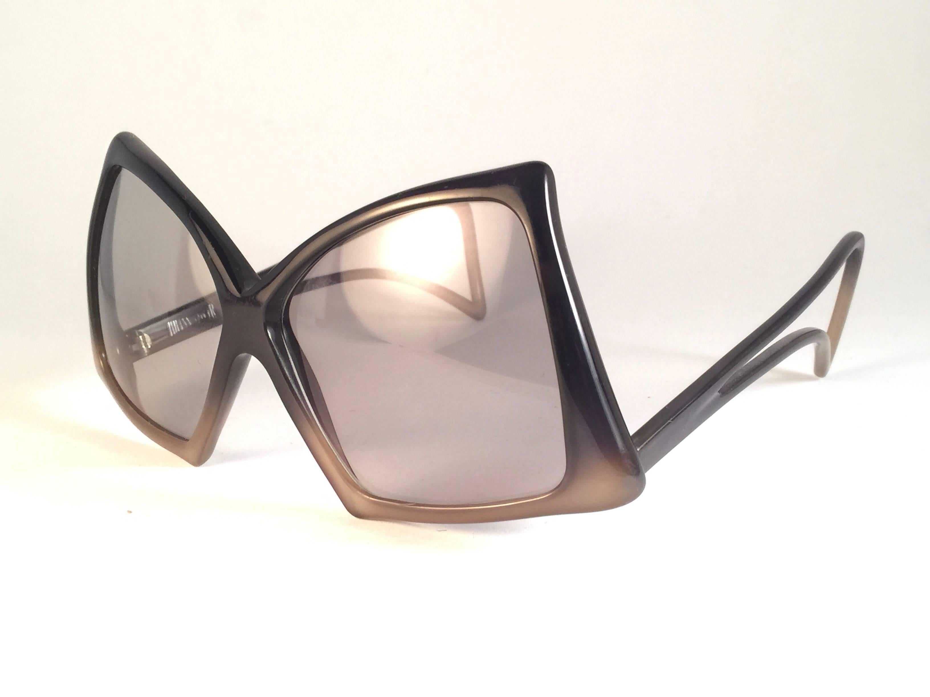 Mint Vintage Miss Dior two tone green frame with spotless smoke grey lenses.   Made in Austria.  
Produced and design in 1970's.  
A collector’s piece!  New, never worn or displayed. It has some wear due to 40 years of storage.