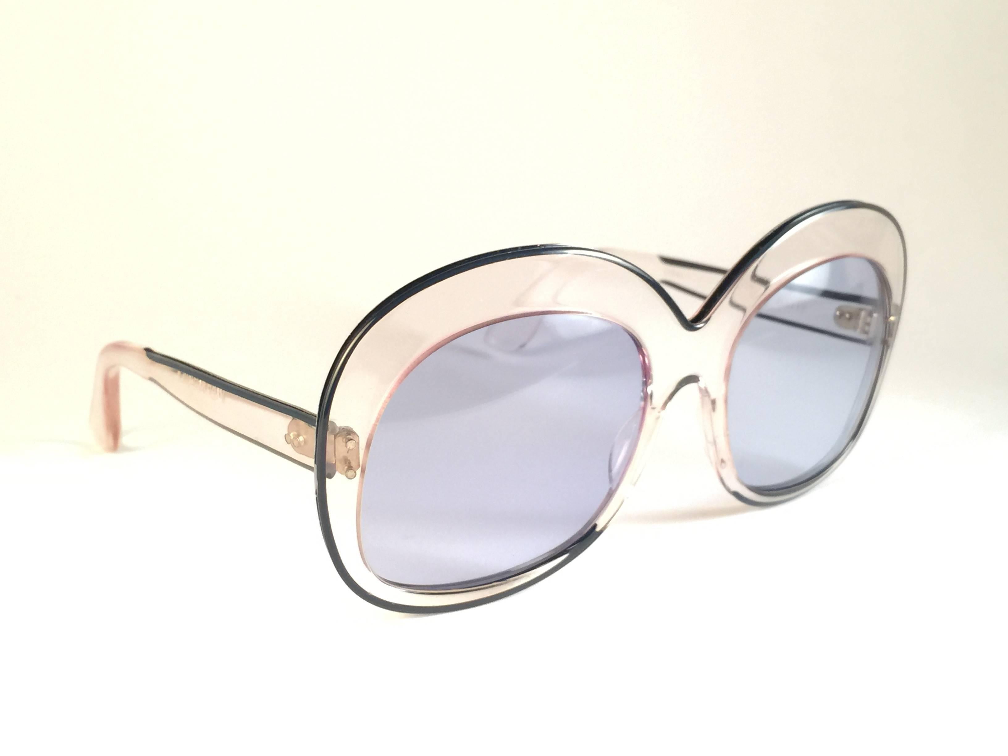 New and ultra rare  " Pierre Marly Sourcilla sunglasses. Spotless light blue lenses. 

Amazing clear oversized frame. Chic and crazy 1960’s Pierre Marly very own cocktail scene. 

A real treasure not to miss out!!

Please noticed this item has
