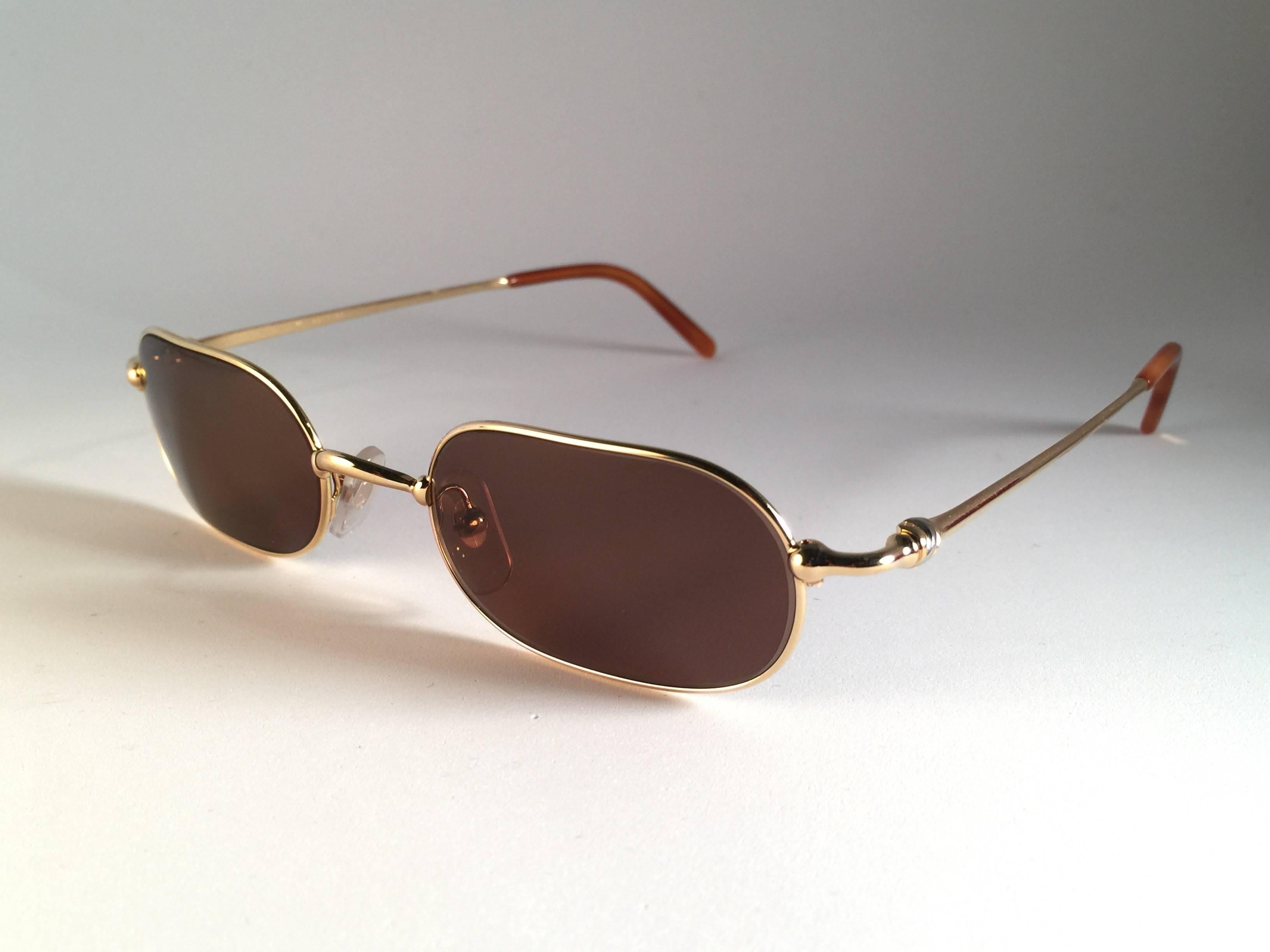 New Vintage Cartier Orfy Gold Plated Solid Brown Lens France 1990 Sunglasses In New Condition In Baleares, Baleares