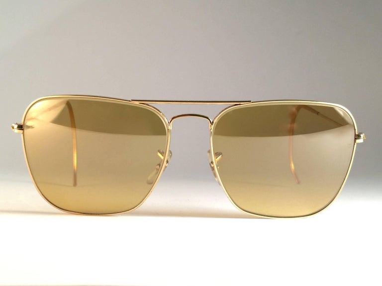 New Vintage Ray Ban Caravan Gold Ambermatic Lenses 1970's B&L Sunglasses at  1stDibs | ray ban caravan ambermatic, ray ban caravan vintage, ray ban  caravans