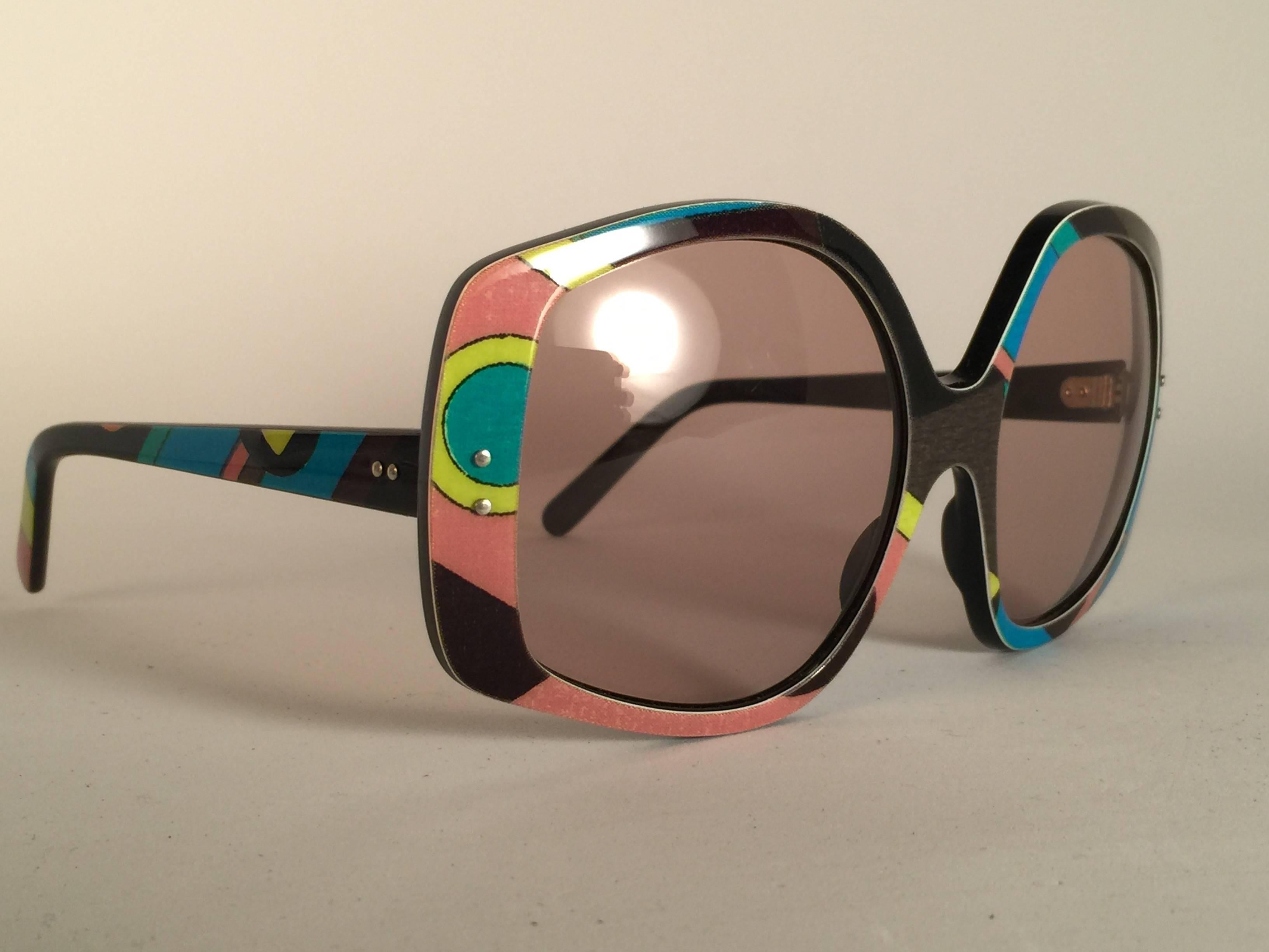 New Vintage Emilio Pucci signature pattern multicolor frame with spotless lenses. Made in France. Produced and design in 1970's. 

A collector’s piece! New, never worn or displayed. It has light wear due to 40 years of storage.