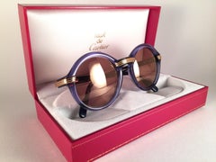 Lunettes de soleil vintage Cartier cabriolet rondes bleu translucide 49MM, France