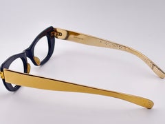 Vintage-Brille von Oliver Goldsmith im Cat-Eye-Stil, schwarz und gold, hergestellt 1960 in Italien